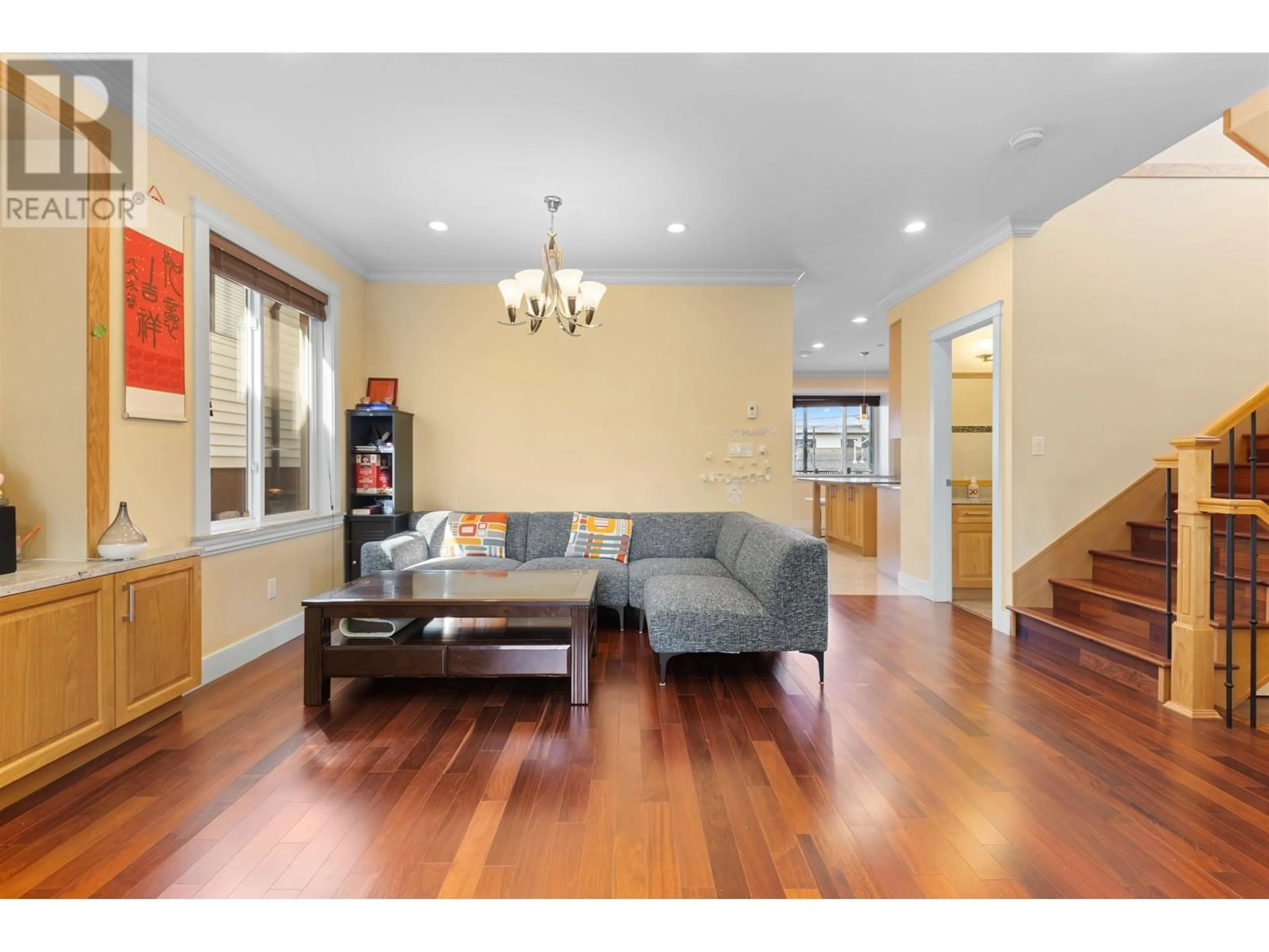 Living room with furniture, wood/laminate floor for 3333 28TH AVENUE, Vancouver British Columbia V5R1T2