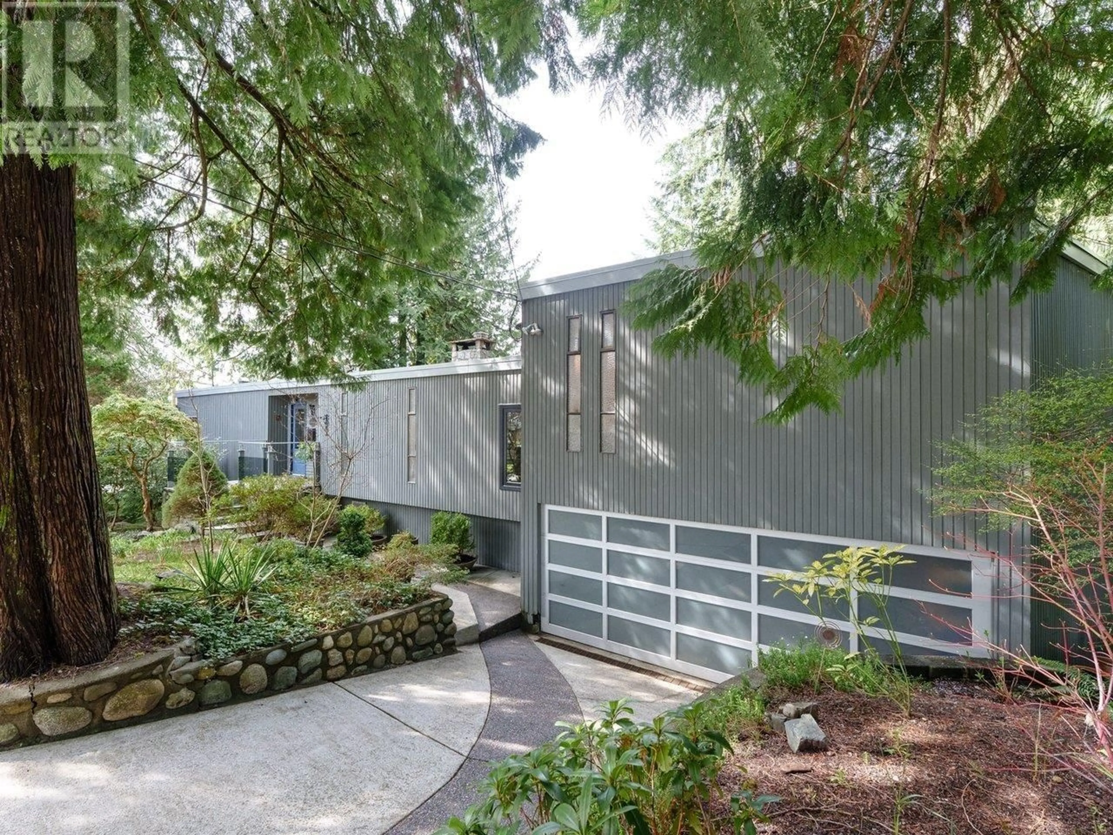 Home with vinyl exterior material, street for 3821 SYMONDS ROAD, North Vancouver British Columbia V7K2L7