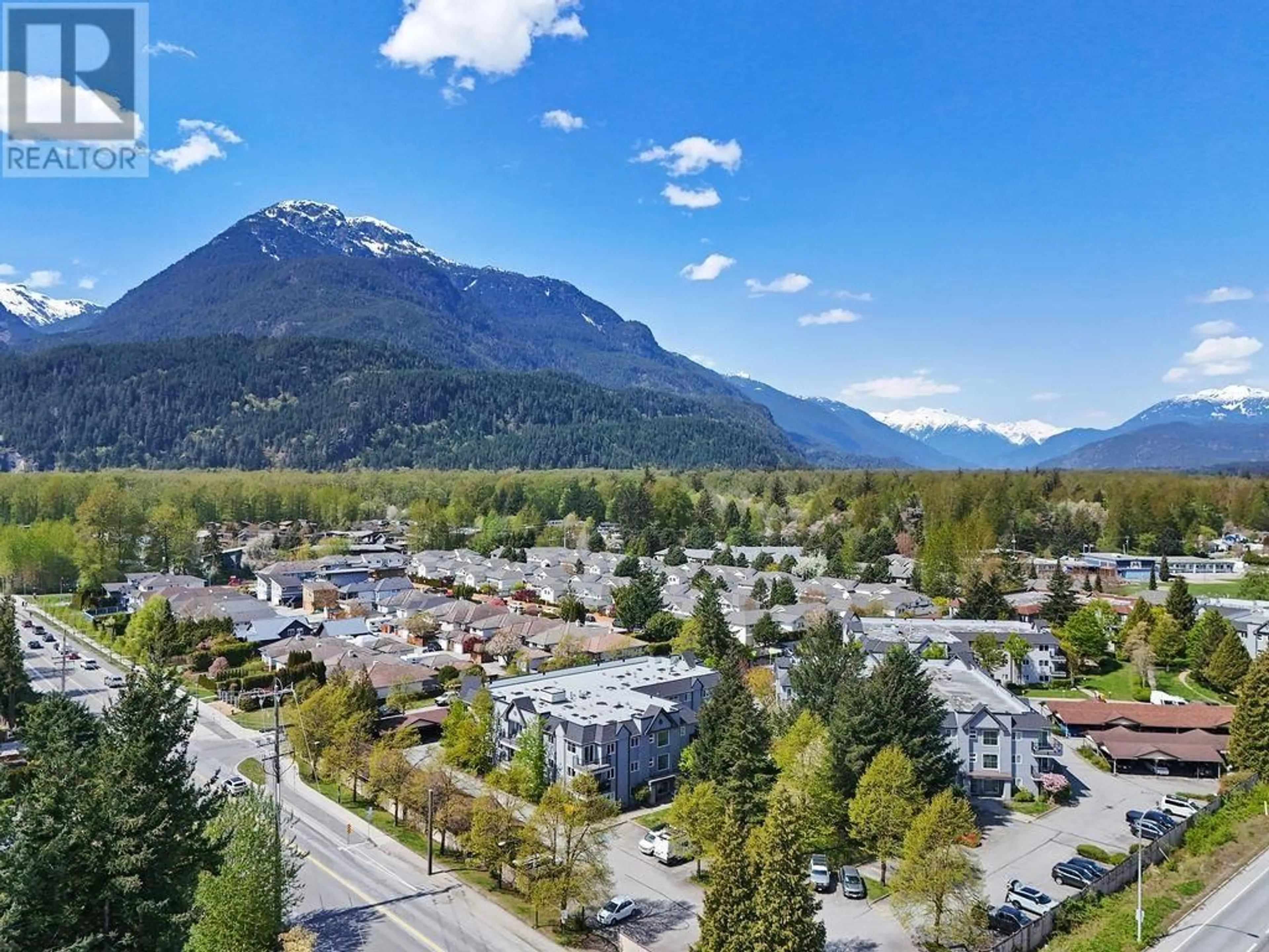 A pic from outside/outdoor area/front of a property/back of a property/a pic from drone, mountain view for A201 - 40100 WILLOW CRESCENT, Squamish British Columbia V8B0L8