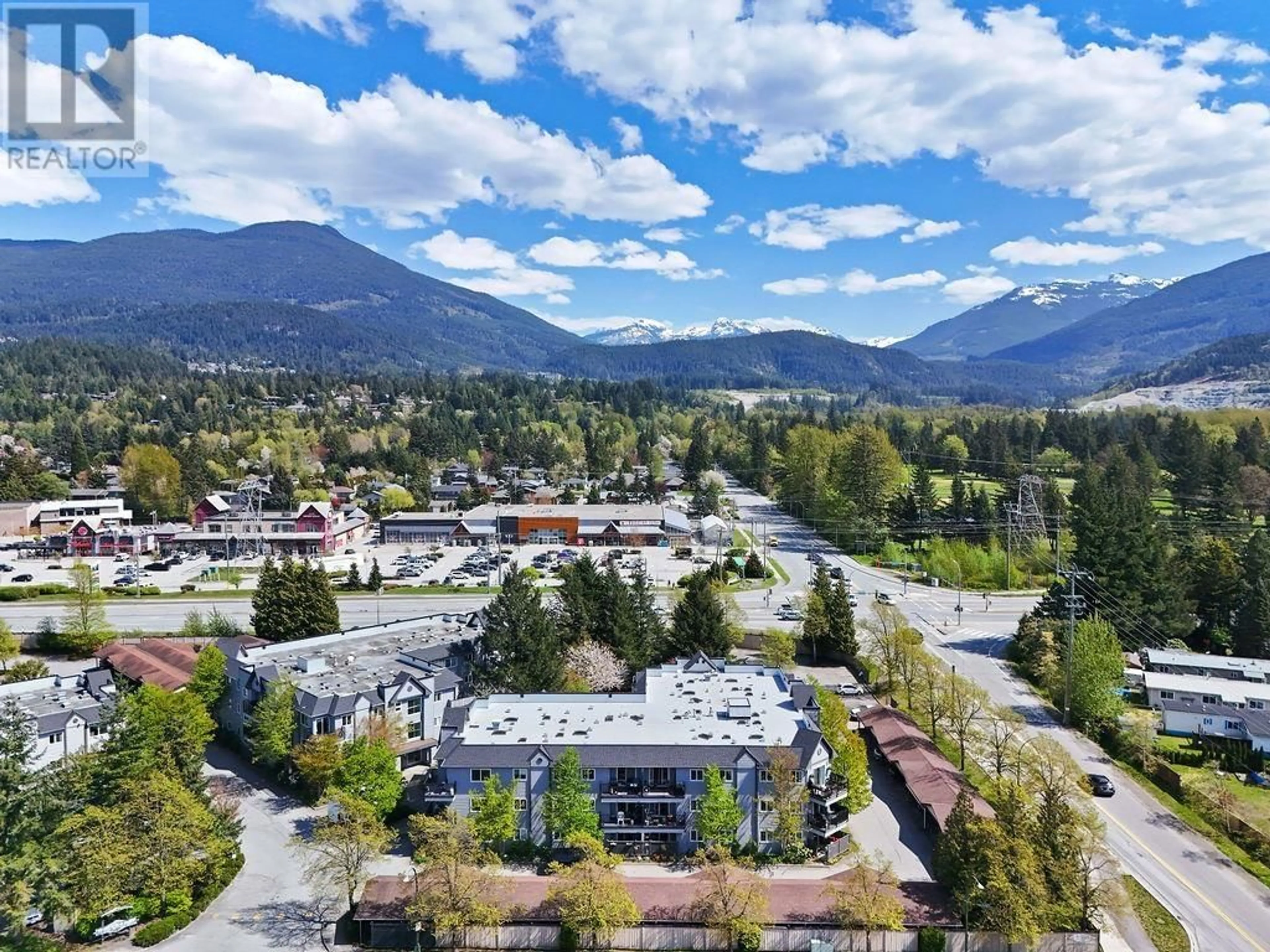 A pic from outside/outdoor area/front of a property/back of a property/a pic from drone, mountain view for A201 - 40100 WILLOW CRESCENT, Squamish British Columbia V8B0L8
