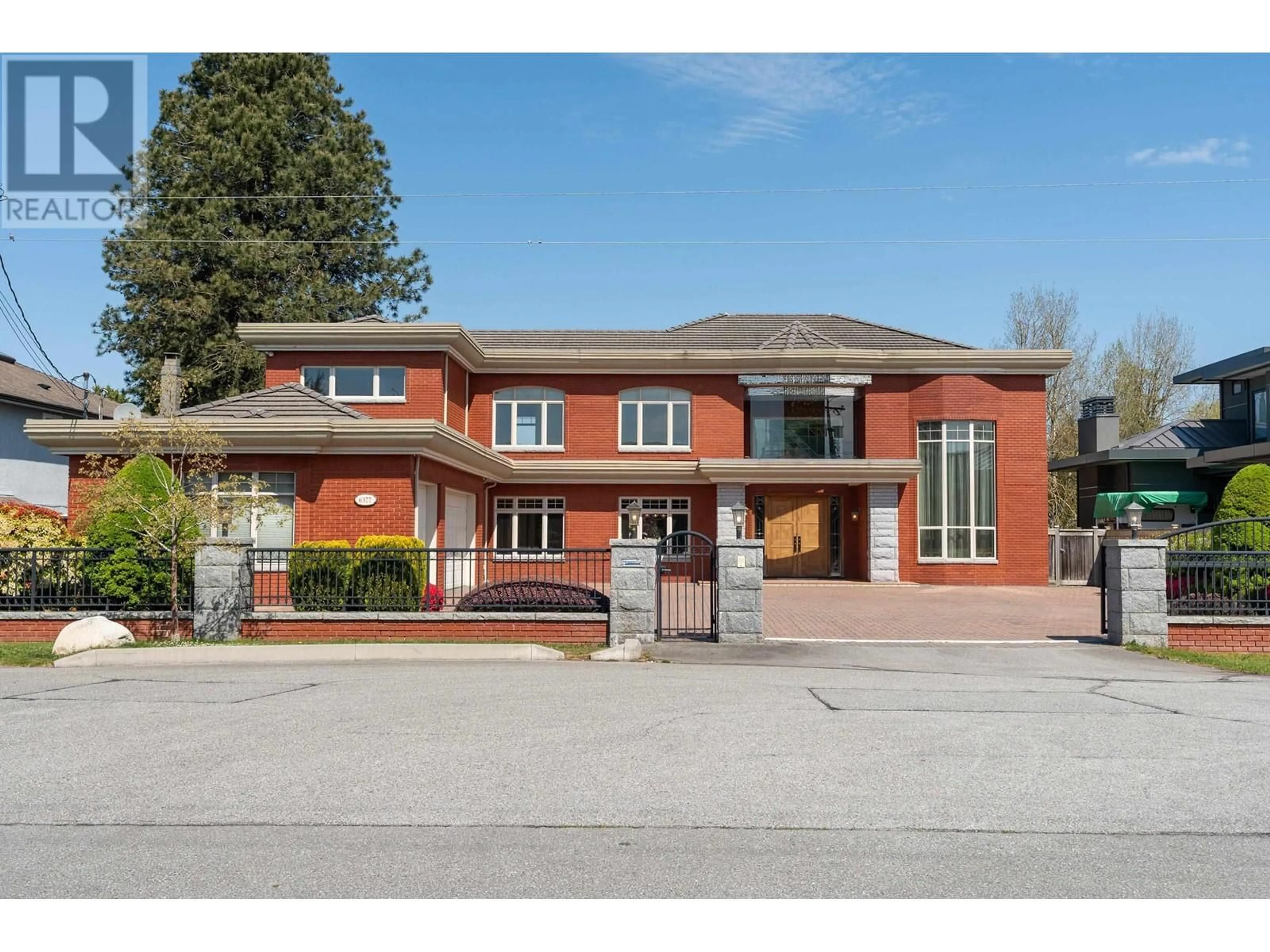 Home with brick exterior material, street for 6377 WOODWARDS ROAD, Richmond British Columbia V7E1H2