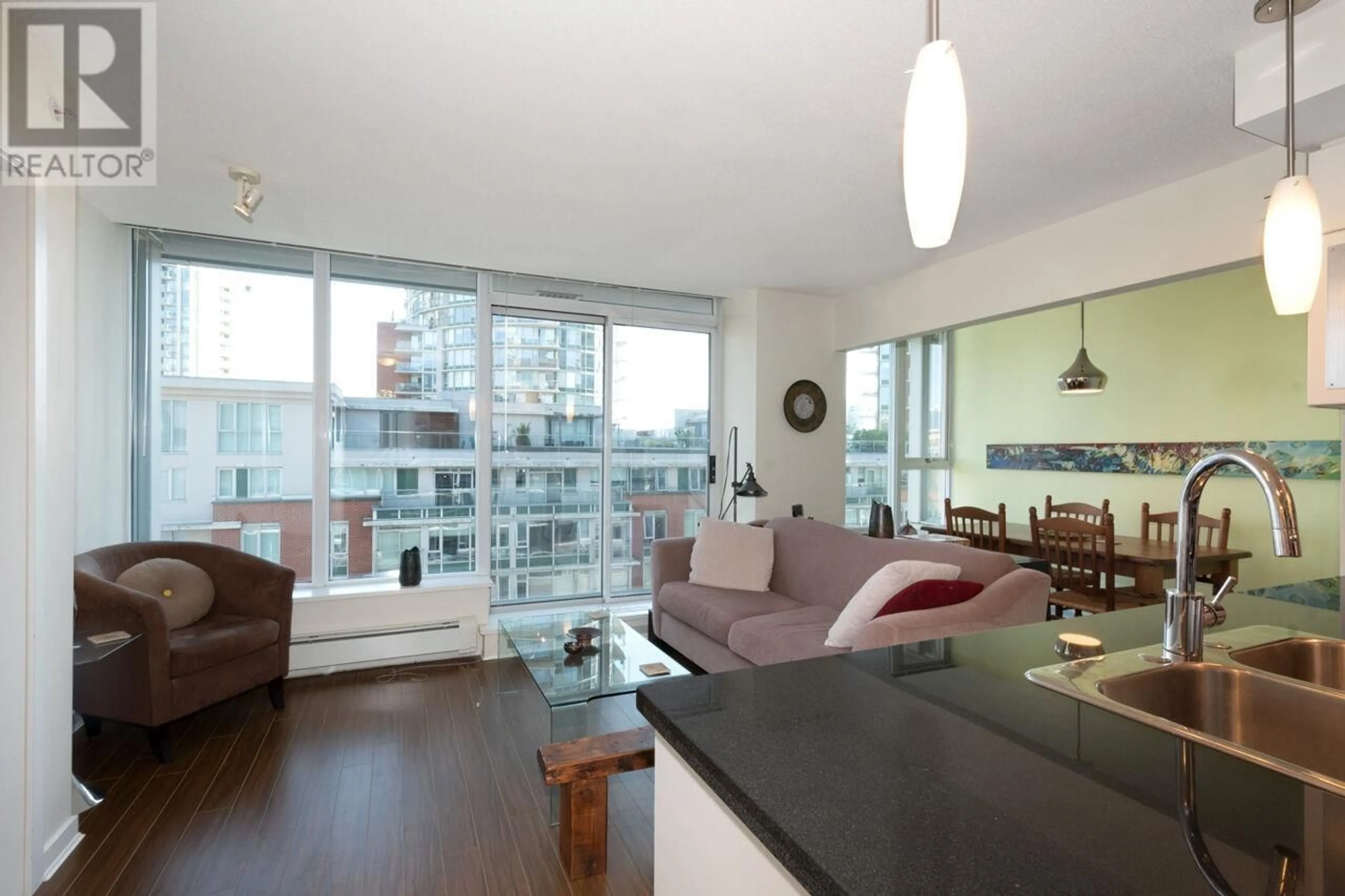 Living room with furniture, wood/laminate floor for 709 - 633 ABBOTT STREET, Vancouver British Columbia V6B0J3