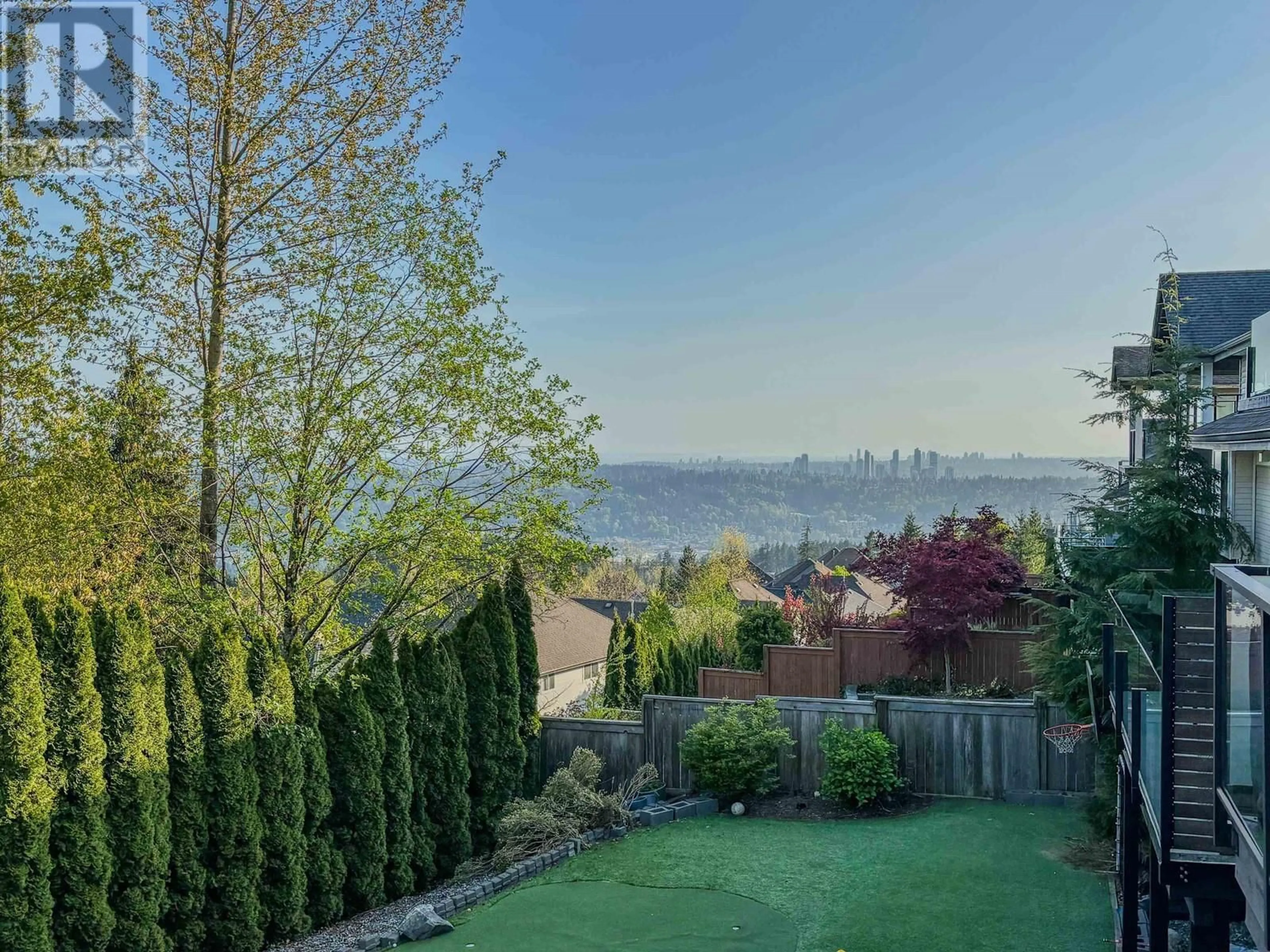A pic from outside/outdoor area/front of a property/back of a property/a pic from drone, water/lake/river/ocean view for 70 FERNWAY DRIVE, Port Moody British Columbia V3H5K5