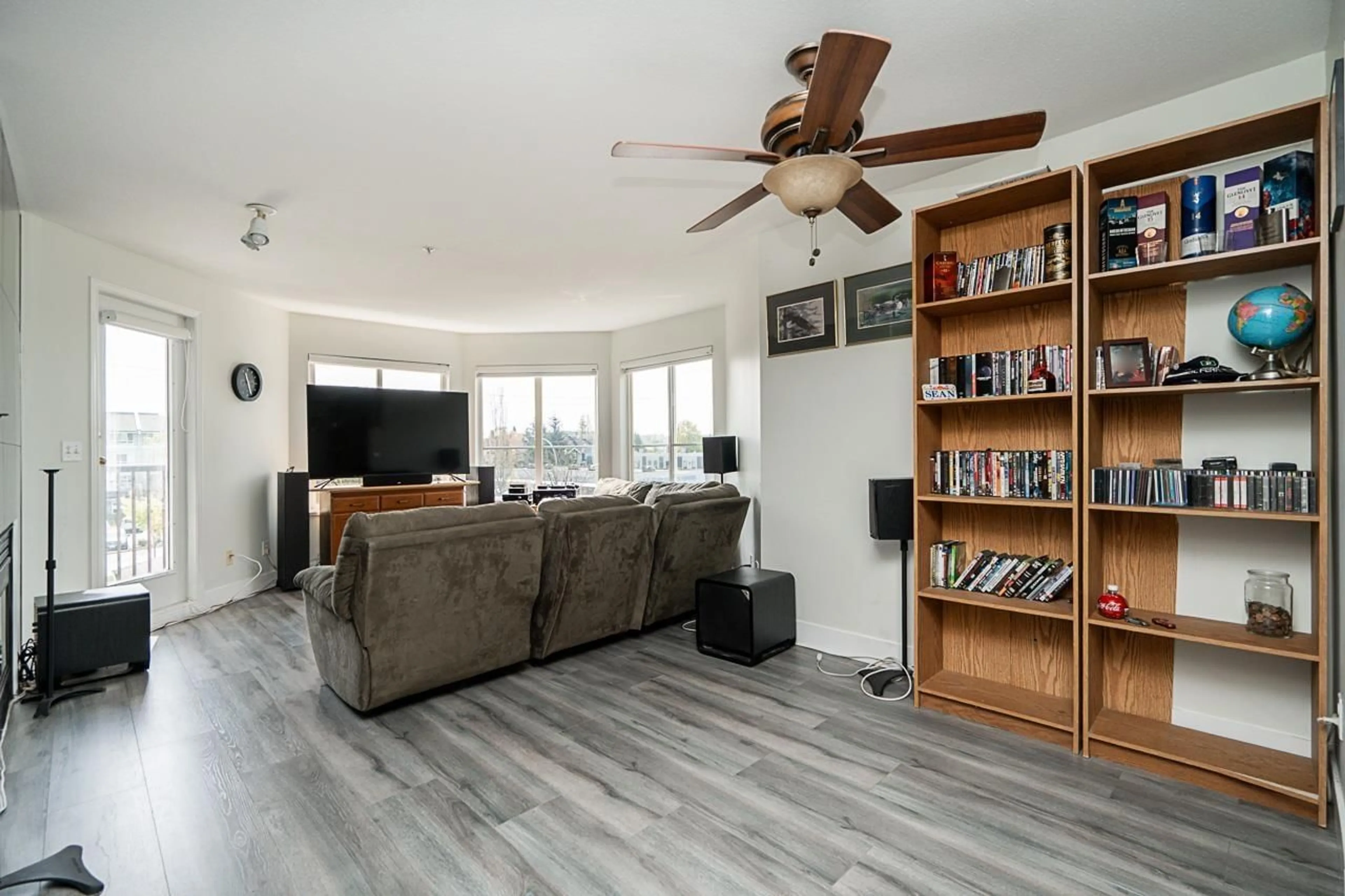 Living room with furniture, wood/laminate floor for 305 - 5765 GLOVER, Langley British Columbia V3A8M8