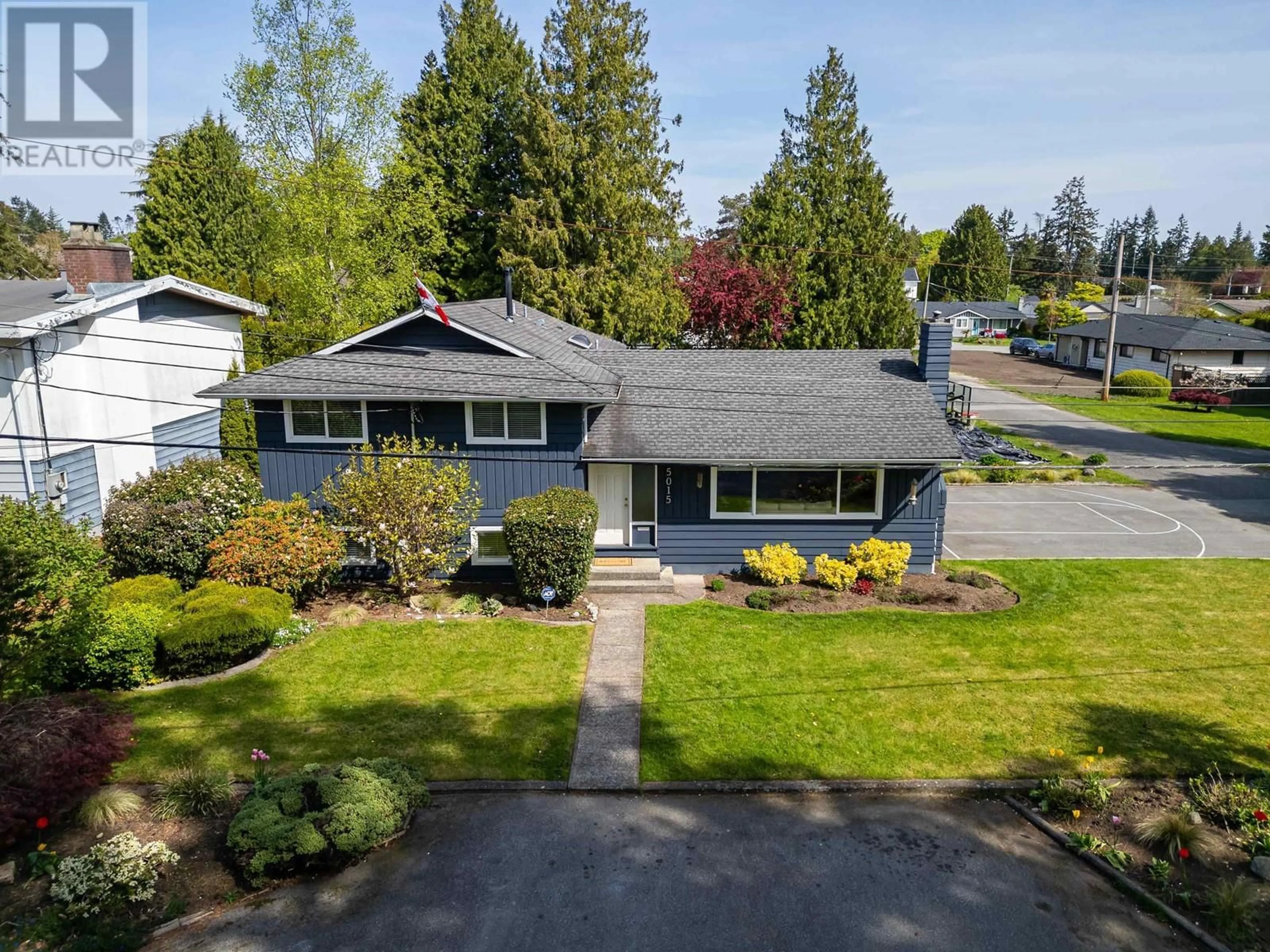 A pic from outside/outdoor area/front of a property/back of a property/a pic from drone, street for 5015 CHEHALIS DRIVE, Delta British Columbia V4M1Y7