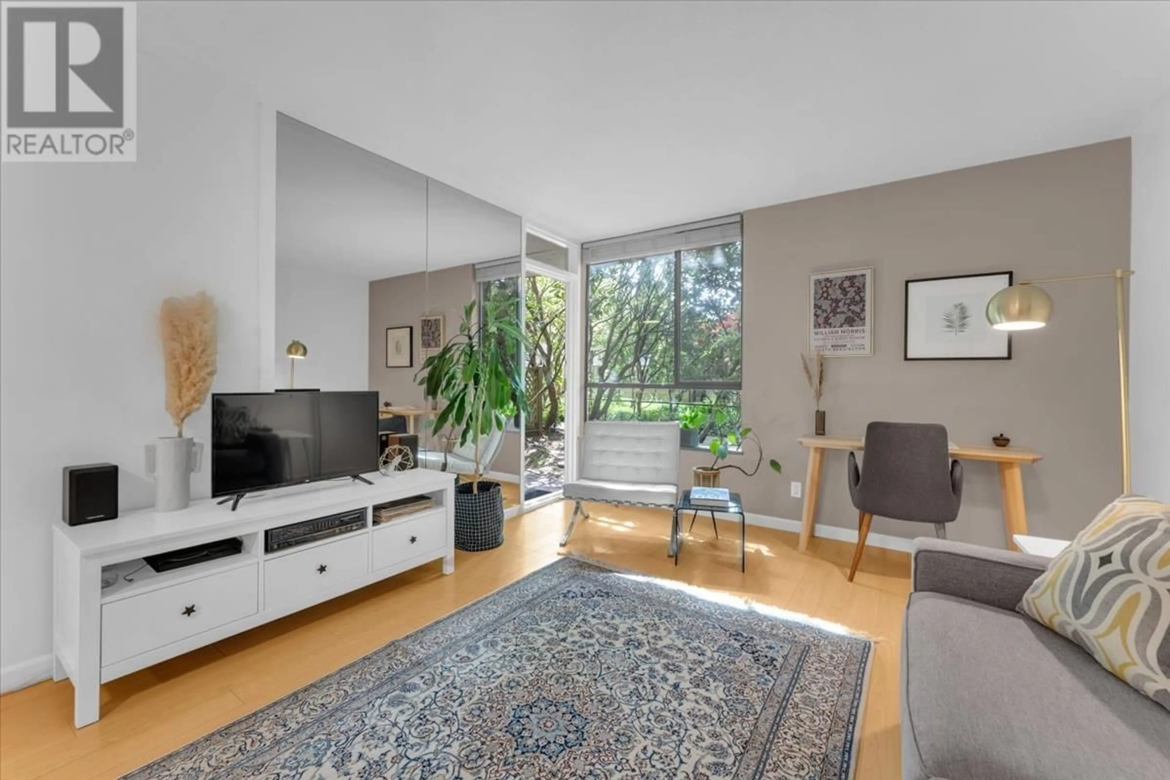 Living room with furniture, unknown for 103 - 3905 SPRINGTREE DRIVE, Vancouver British Columbia V6L3E2