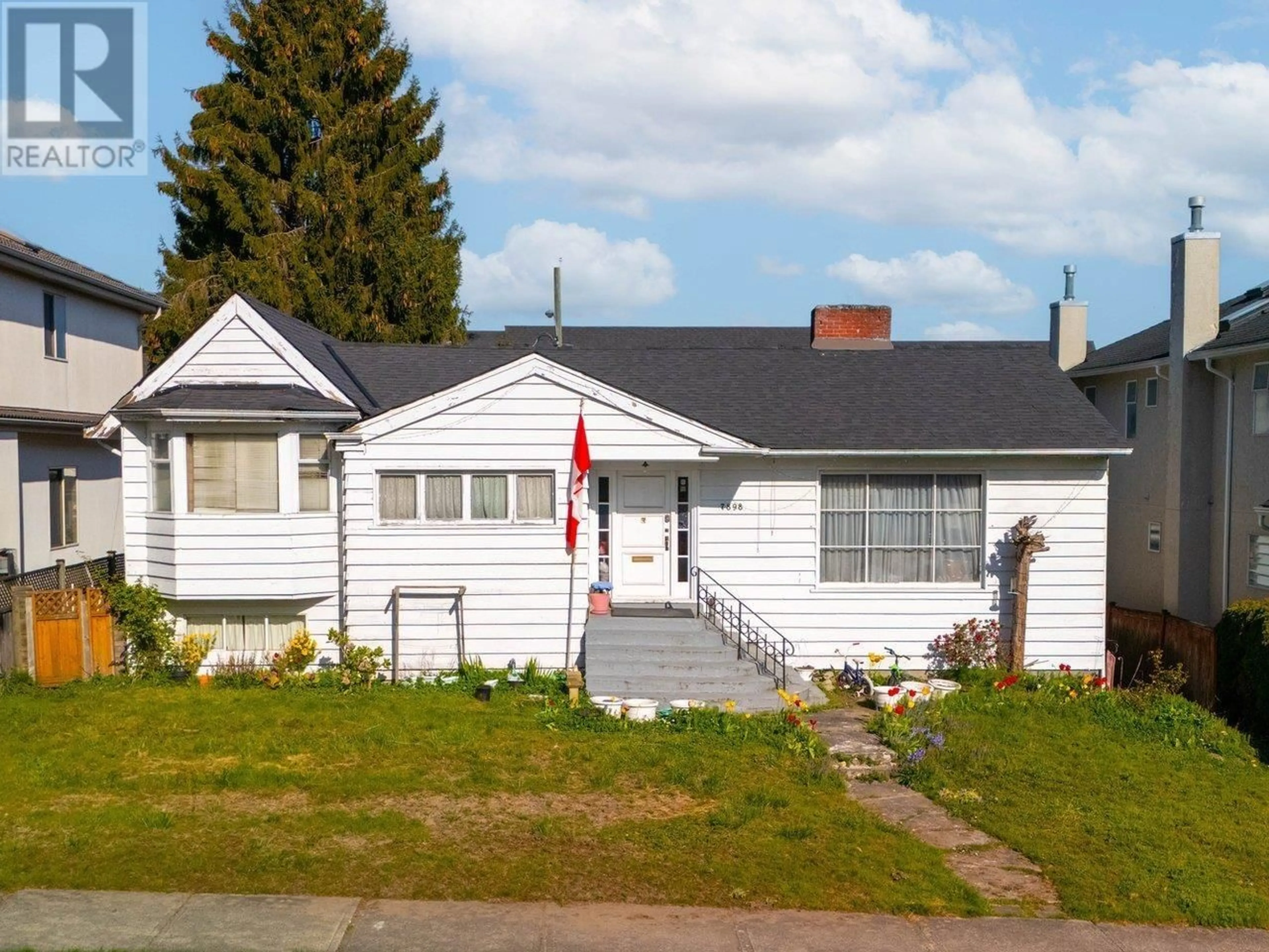 Home with vinyl exterior material, street for 7898 OSLER STREET, Vancouver British Columbia V6P4E1