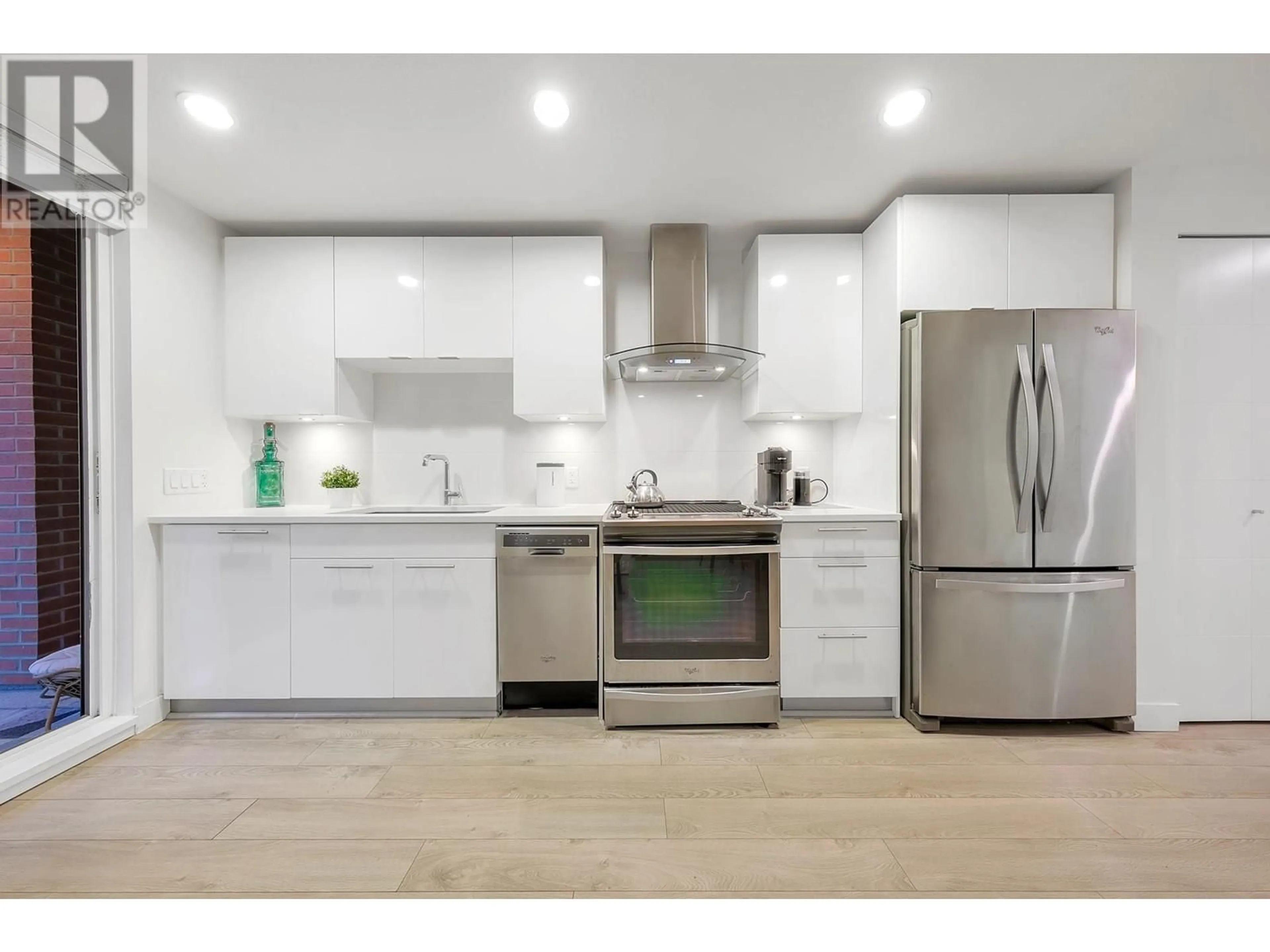 Open concept kitchen, unknown for 318 - 723 3RD STREET, North Vancouver British Columbia V7M0E4