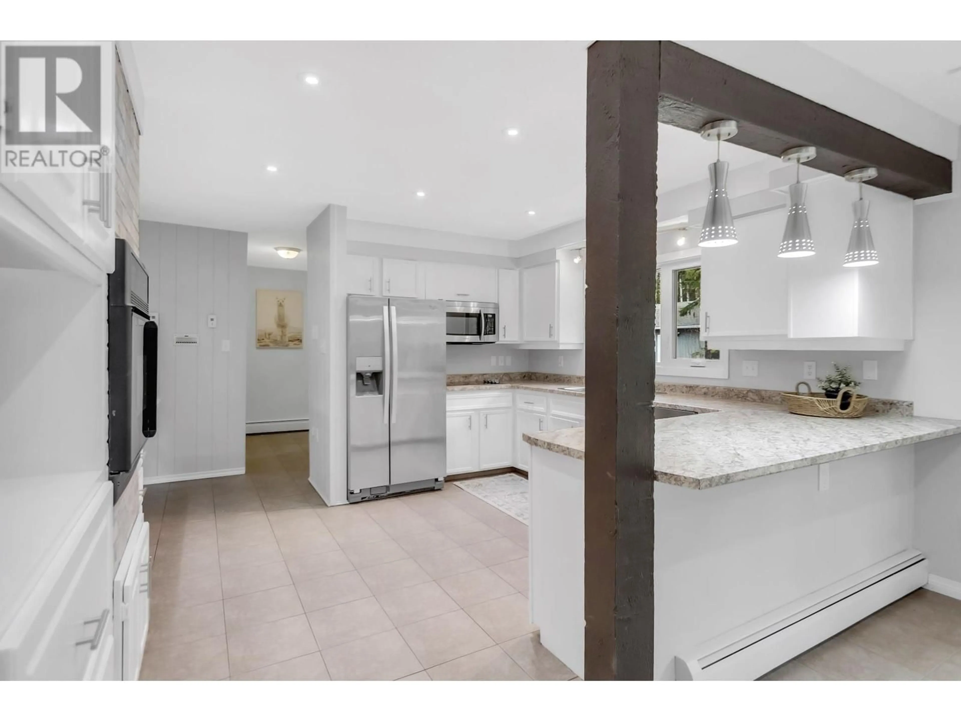 Open concept kitchen, ceramic/tile floor for 6768 BENCH DRIVE, Prince George British Columbia V2K4Z1