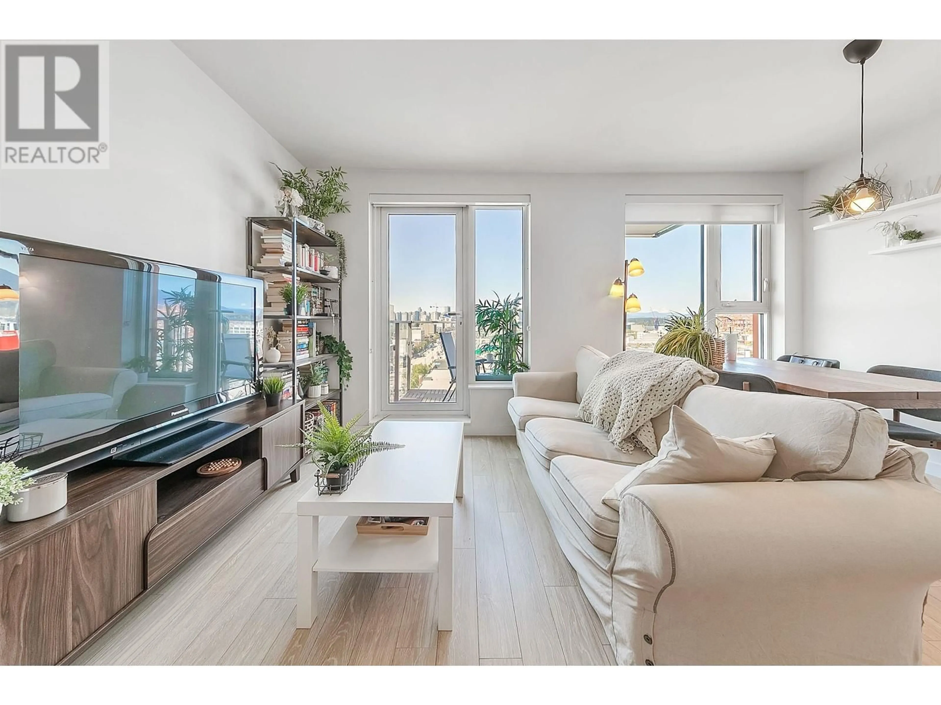 Living room with furniture, wood/laminate floor for 1101 - 933 HASTINGS STREET, Vancouver British Columbia V6A0G6