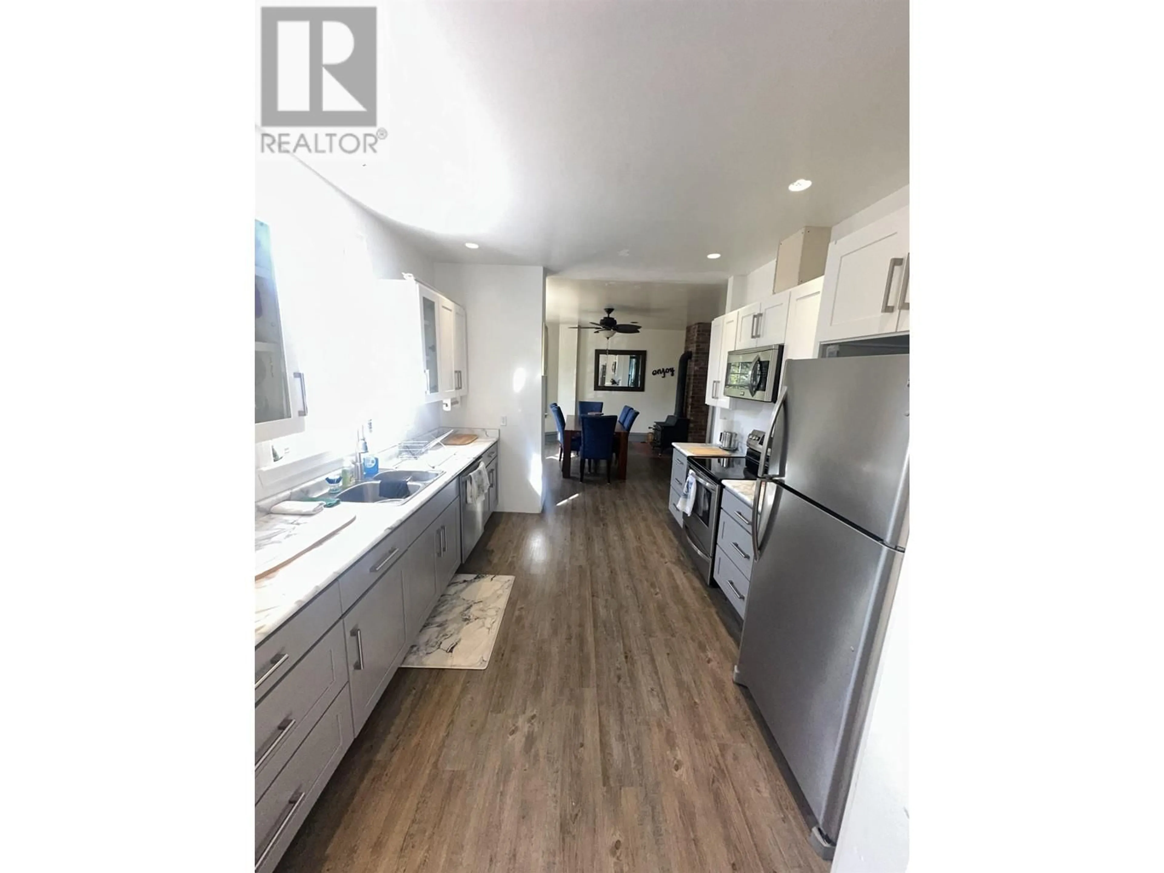 Open concept kitchen, unknown for 6649 RAYFIELD ROAD, 70 Mile House British Columbia V0K2K0