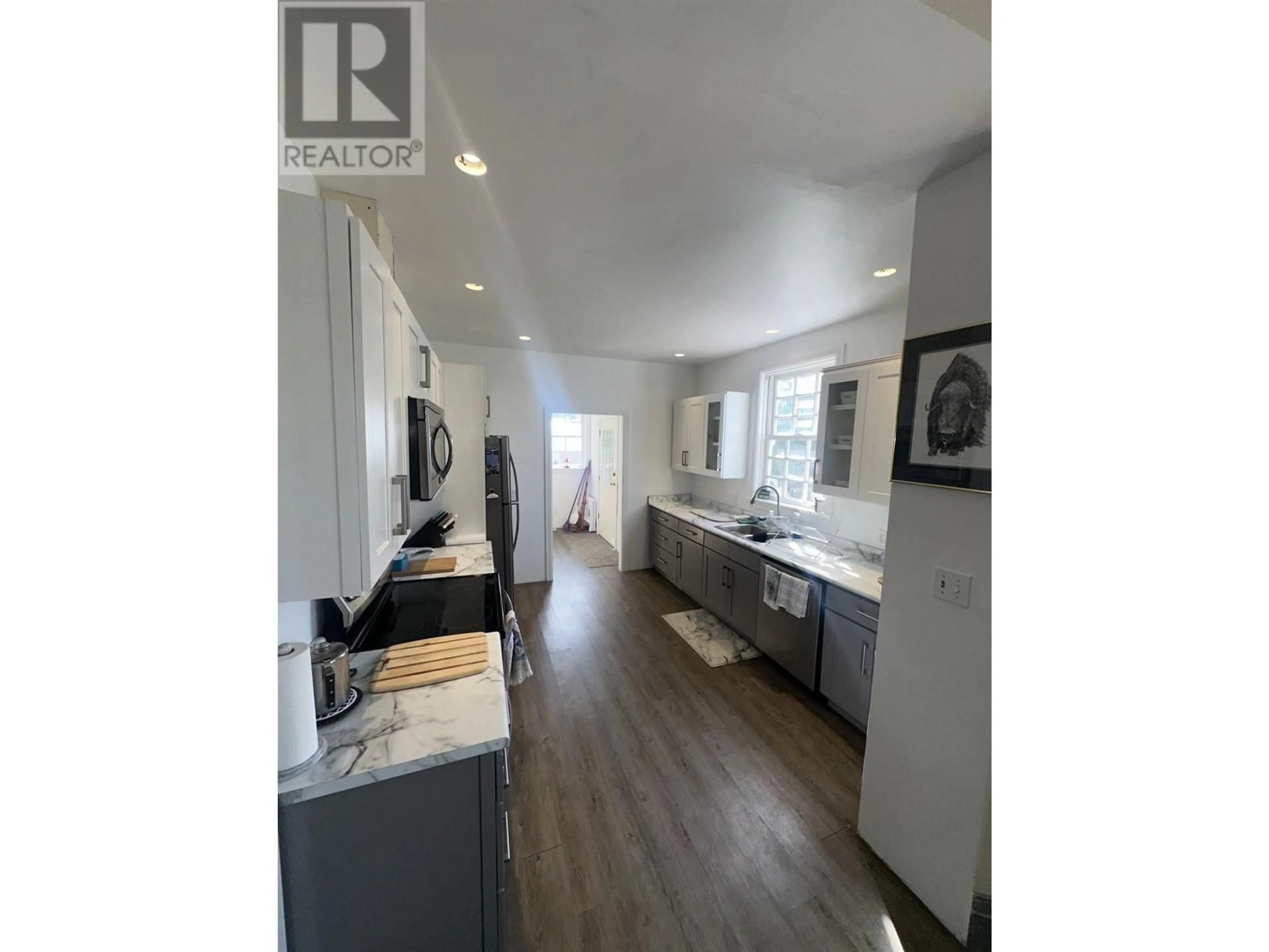 Open concept kitchen, unknown for 6649 RAYFIELD ROAD, 70 Mile House British Columbia V0K2K0