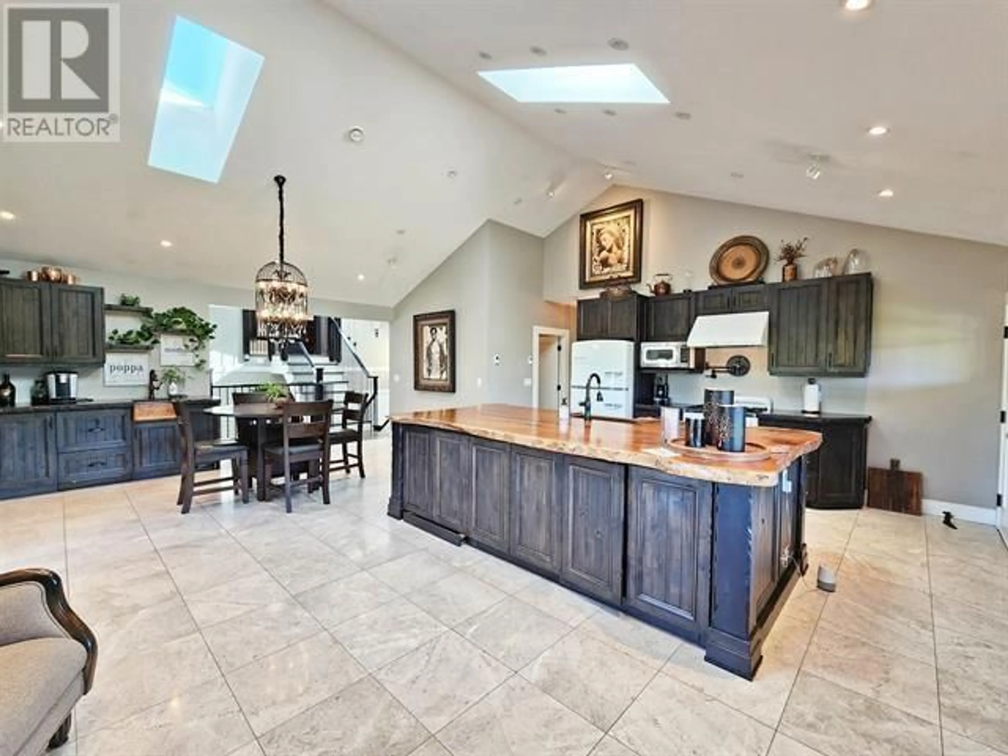 Open concept kitchen, ceramic/tile floor for 683 ST LAURENT AVENUE, Quesnel British Columbia V2J2E5