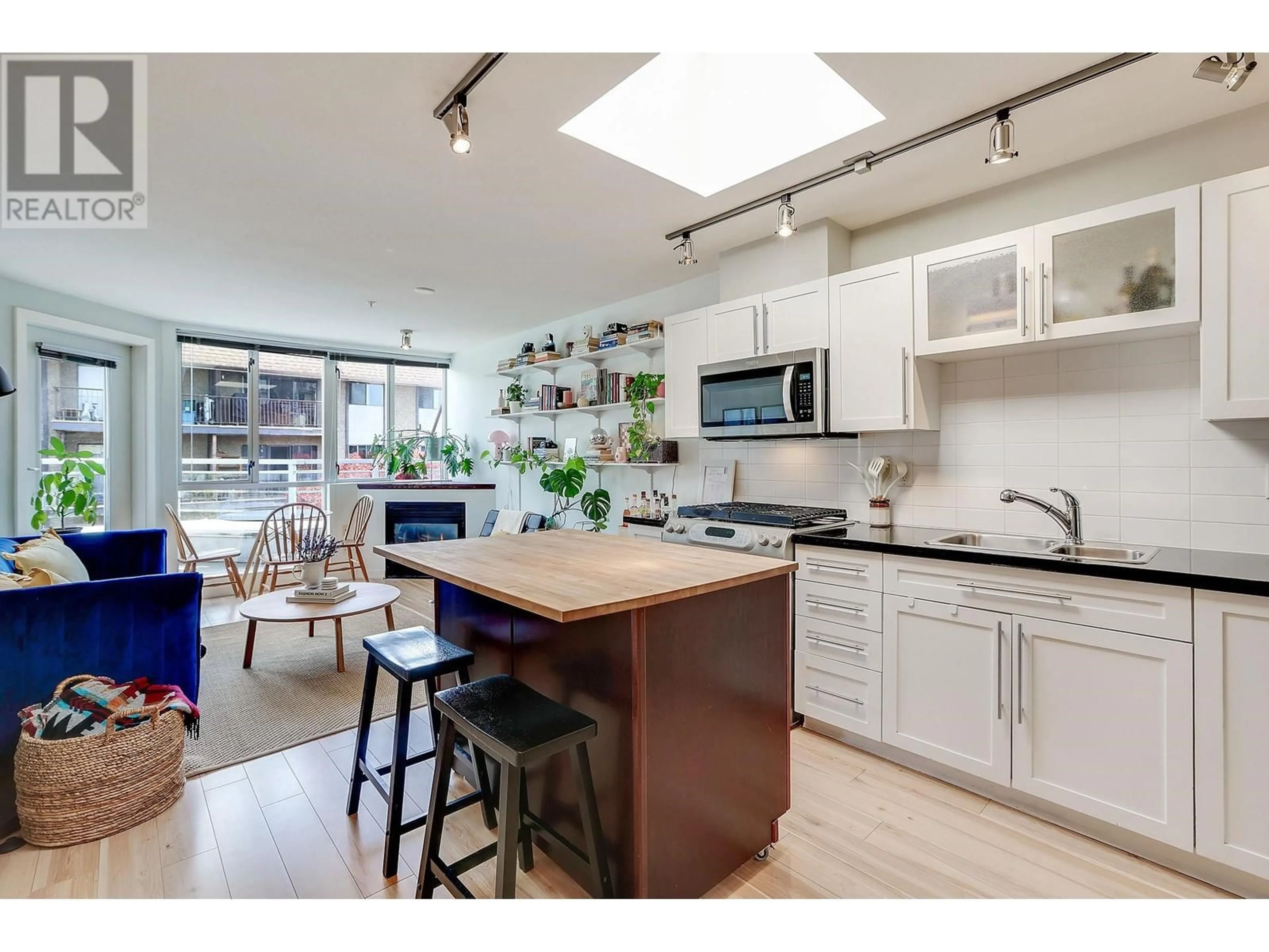 Open concept kitchen, unknown for 504 - 122 3RD STREET, North Vancouver British Columbia V7L1E6