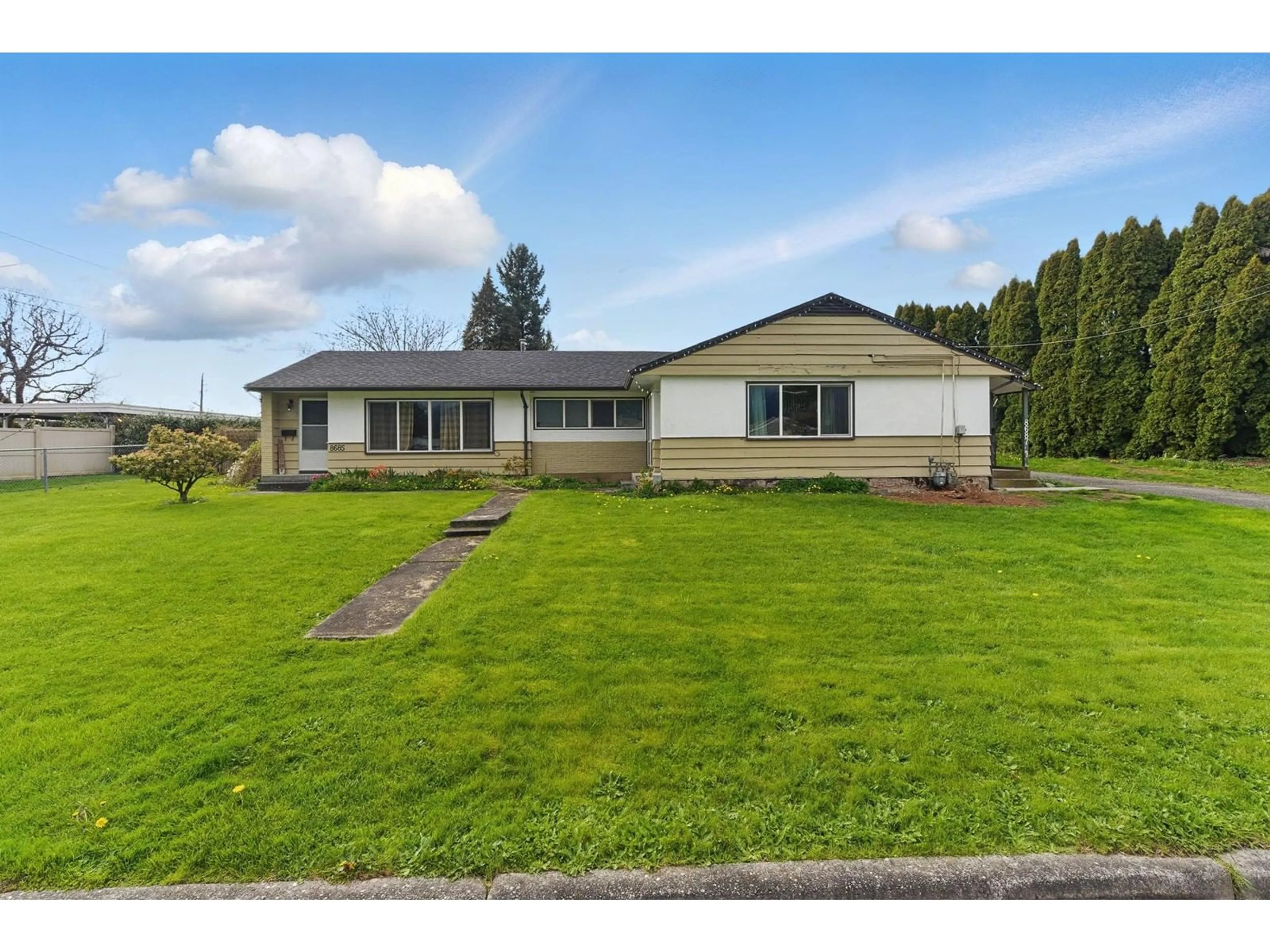 A pic from outside/outdoor area/front of a property/back of a property/a pic from drone, street for 8687 ELM DRIVE, Chilliwack British Columbia V2P4Y3
