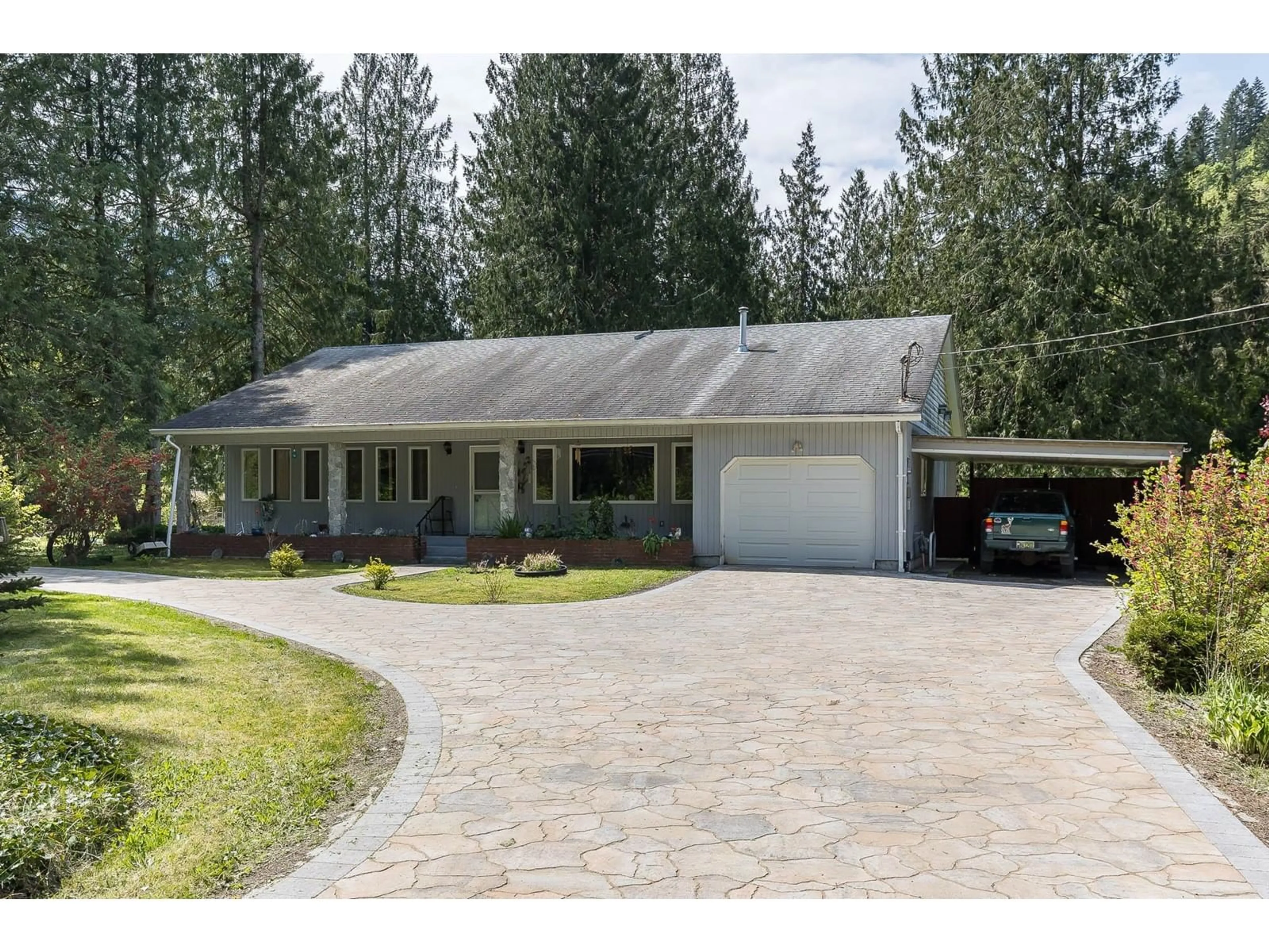 Home with vinyl exterior material, street for 50621 O'BYRNE ROAD, Sardis - Chwk River Valley British Columbia V4Z1B4