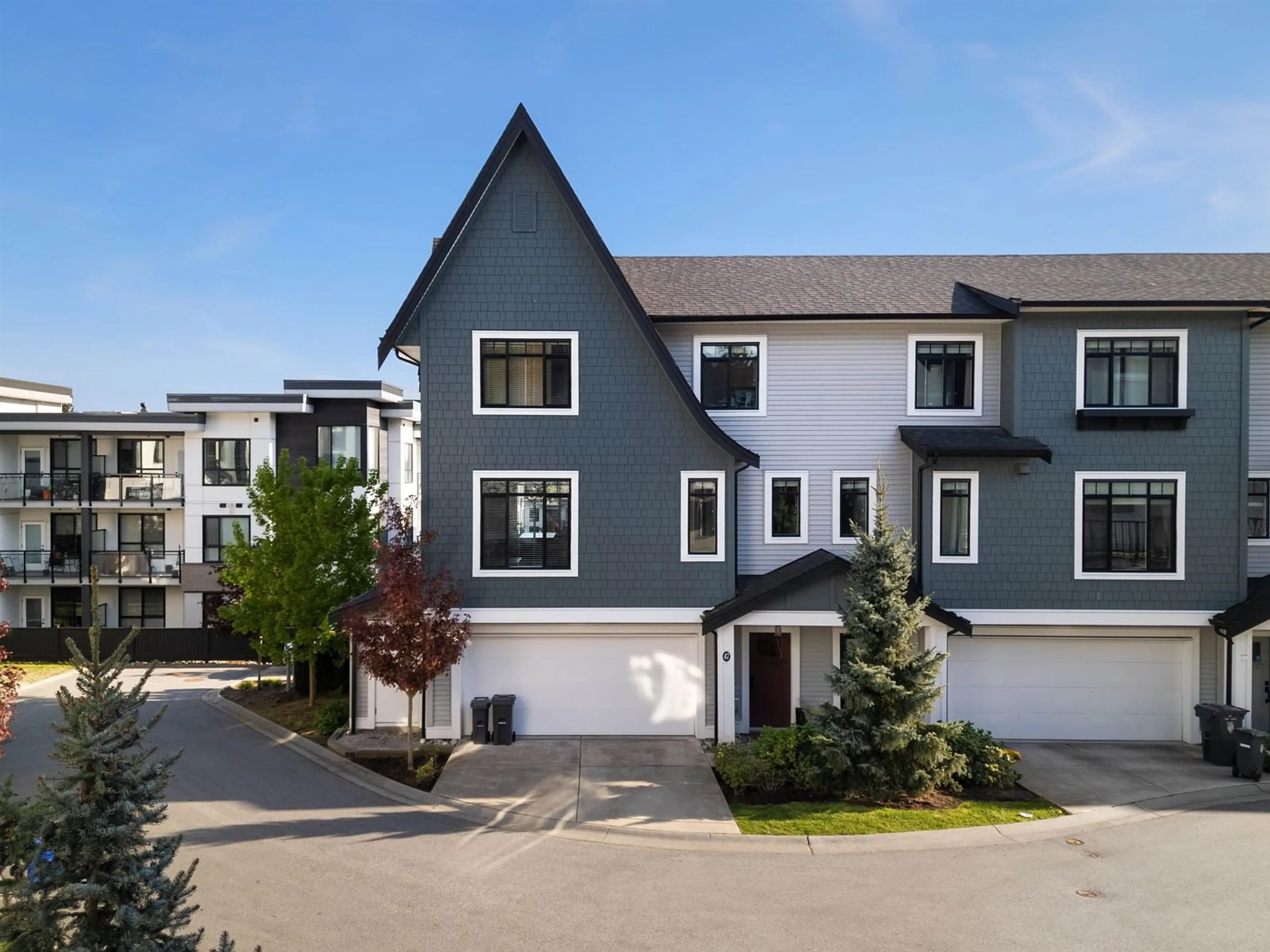 A pic from outside/outdoor area/front of a property/back of a property/a pic from drone, street for 47 - 6897 201, Langley British Columbia V2Y0Z3