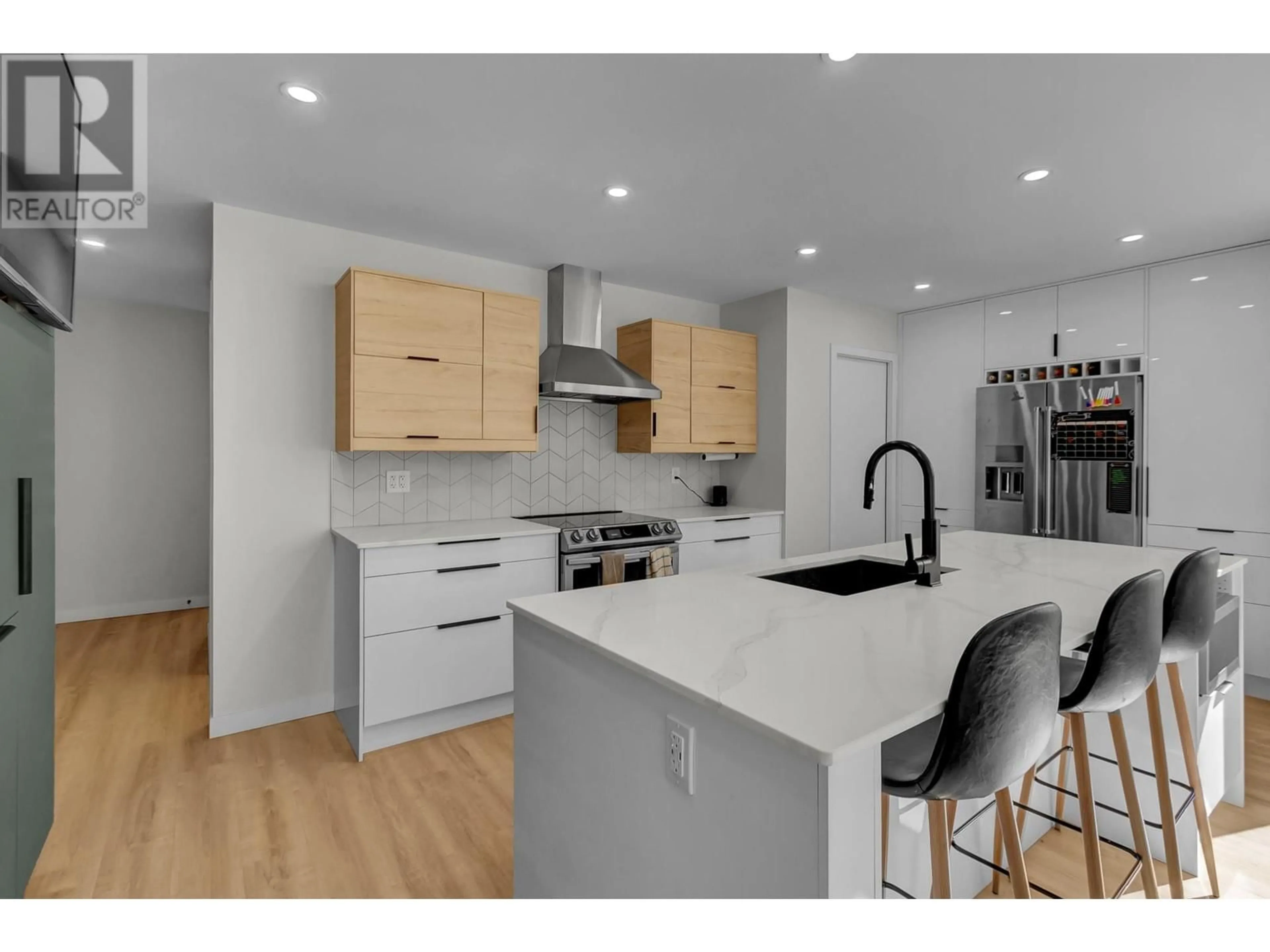 Open concept kitchen, wood/laminate floor for 155 - 4393 COWART ROAD, Prince George British Columbia V2N0H8