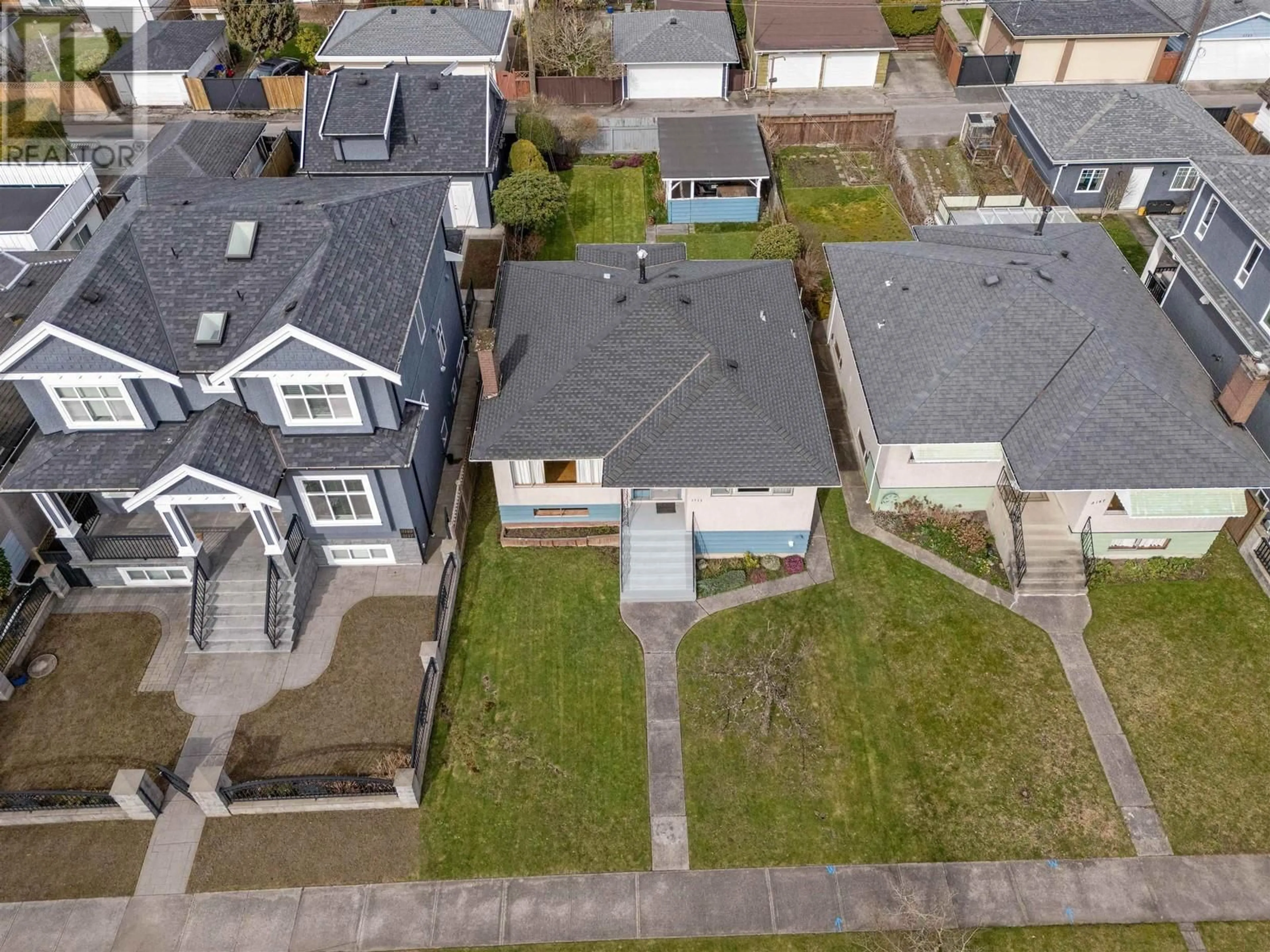 A pic from outside/outdoor area/front of a property/back of a property/a pic from drone, street for 3155 52ND AVENUE, Vancouver British Columbia V5S1T7
