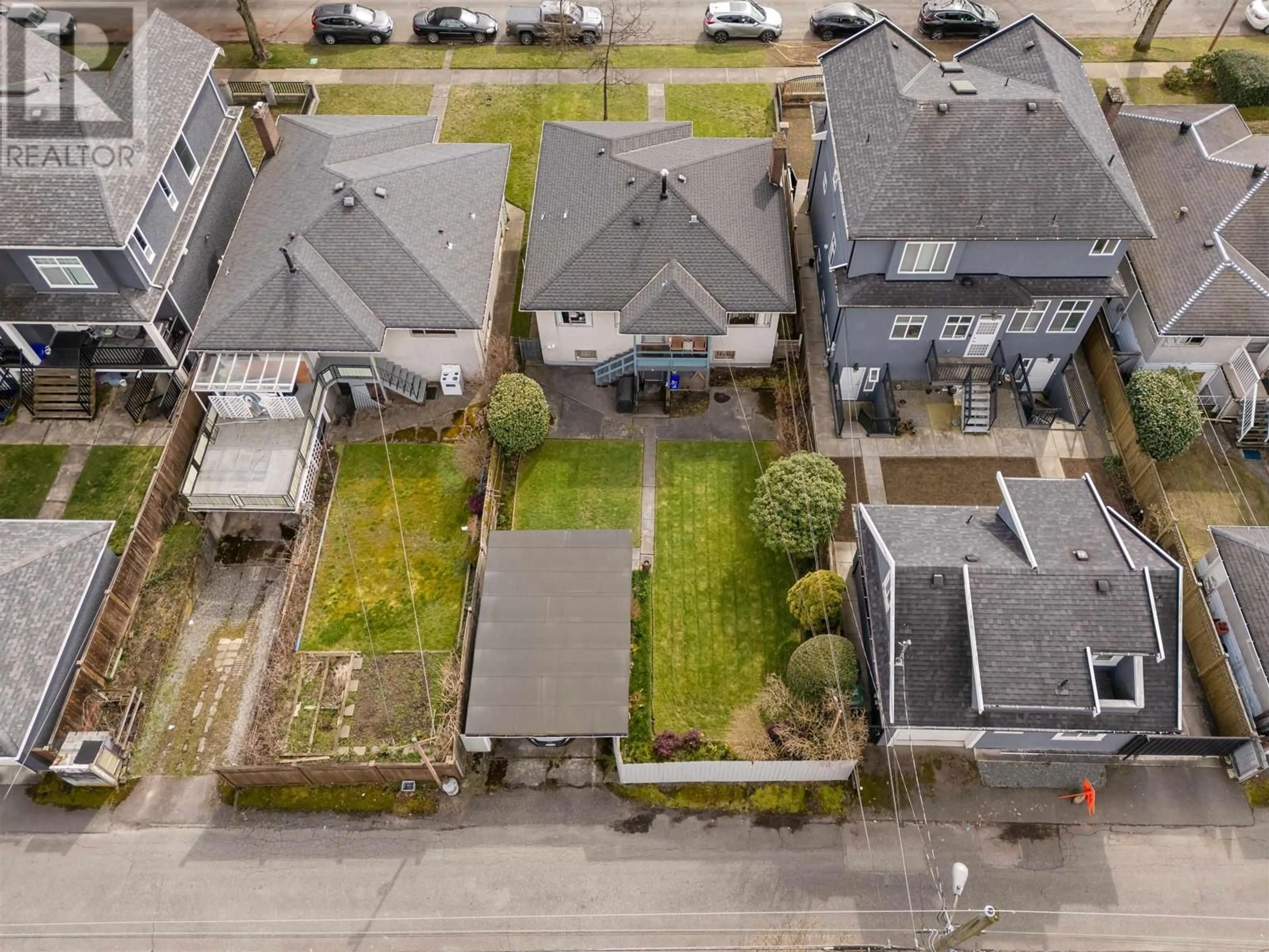 A pic from outside/outdoor area/front of a property/back of a property/a pic from drone, street for 3155 52ND AVENUE, Vancouver British Columbia V5S1T7