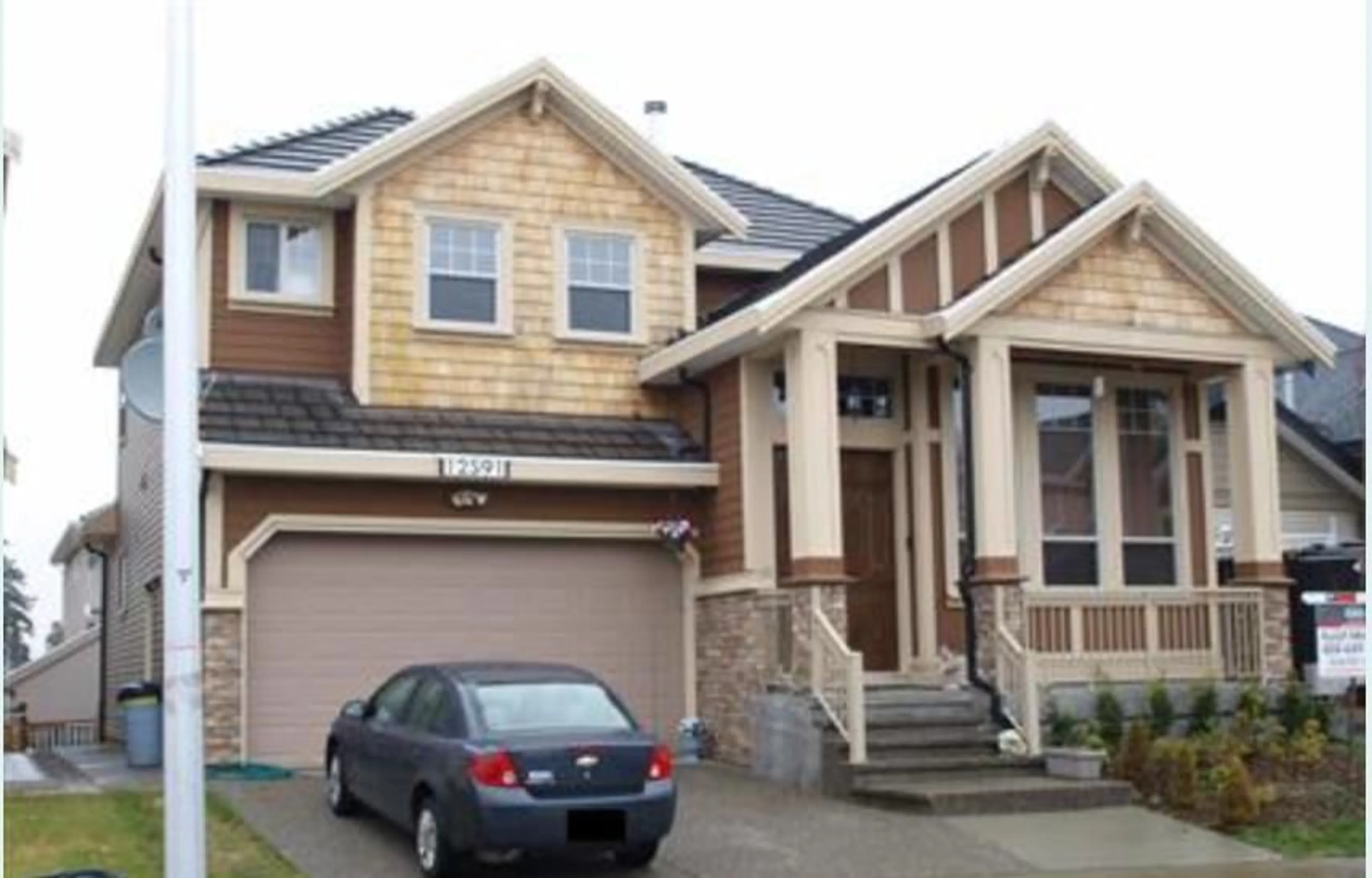 Home with vinyl exterior material, street for 12591 66B, Surrey British Columbia V3W1V8
