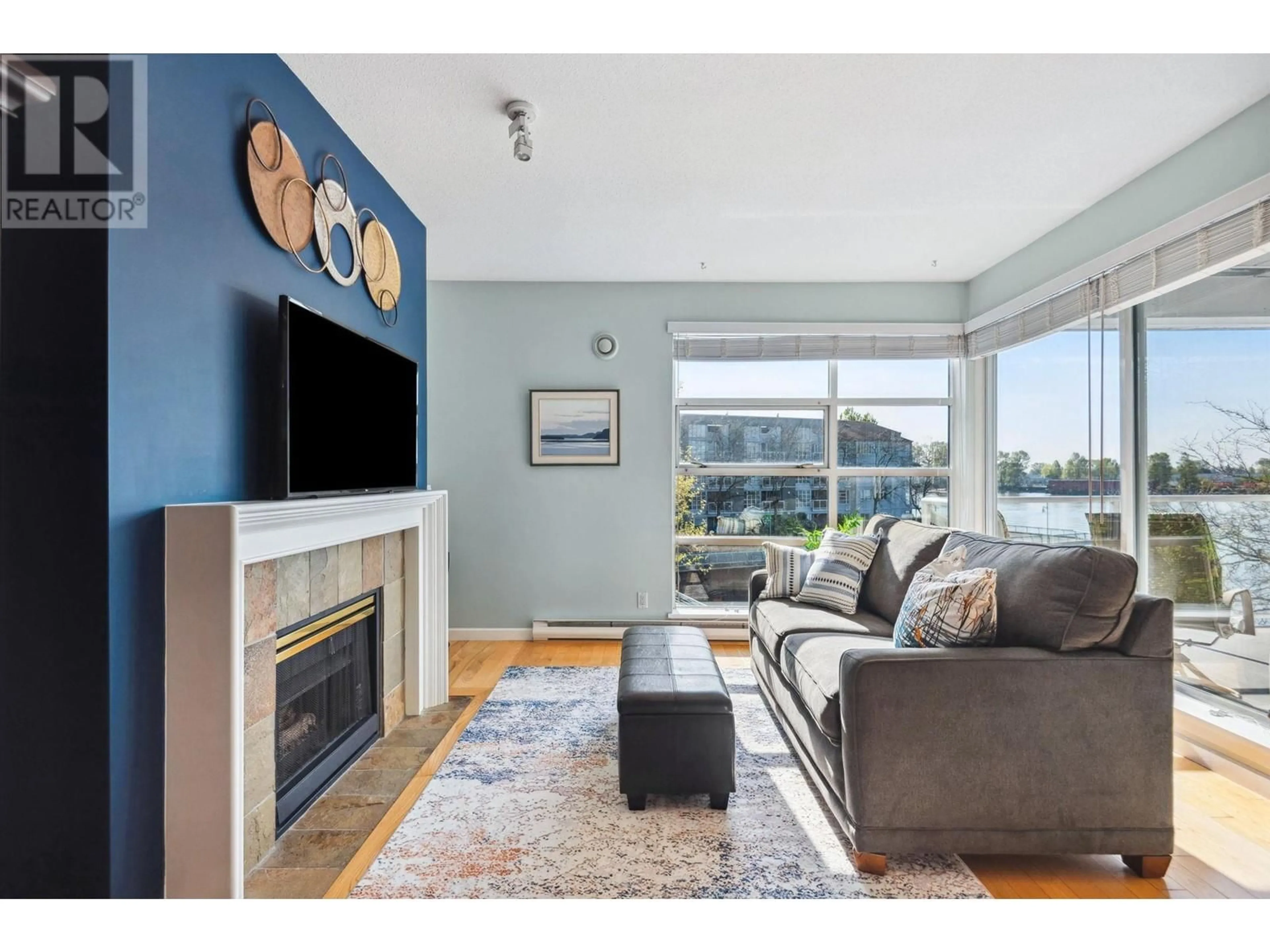 Living room with furniture, wood/laminate floor for 311 - 1990 KENT AVENUE SOUTH, Vancouver British Columbia V5P4X5