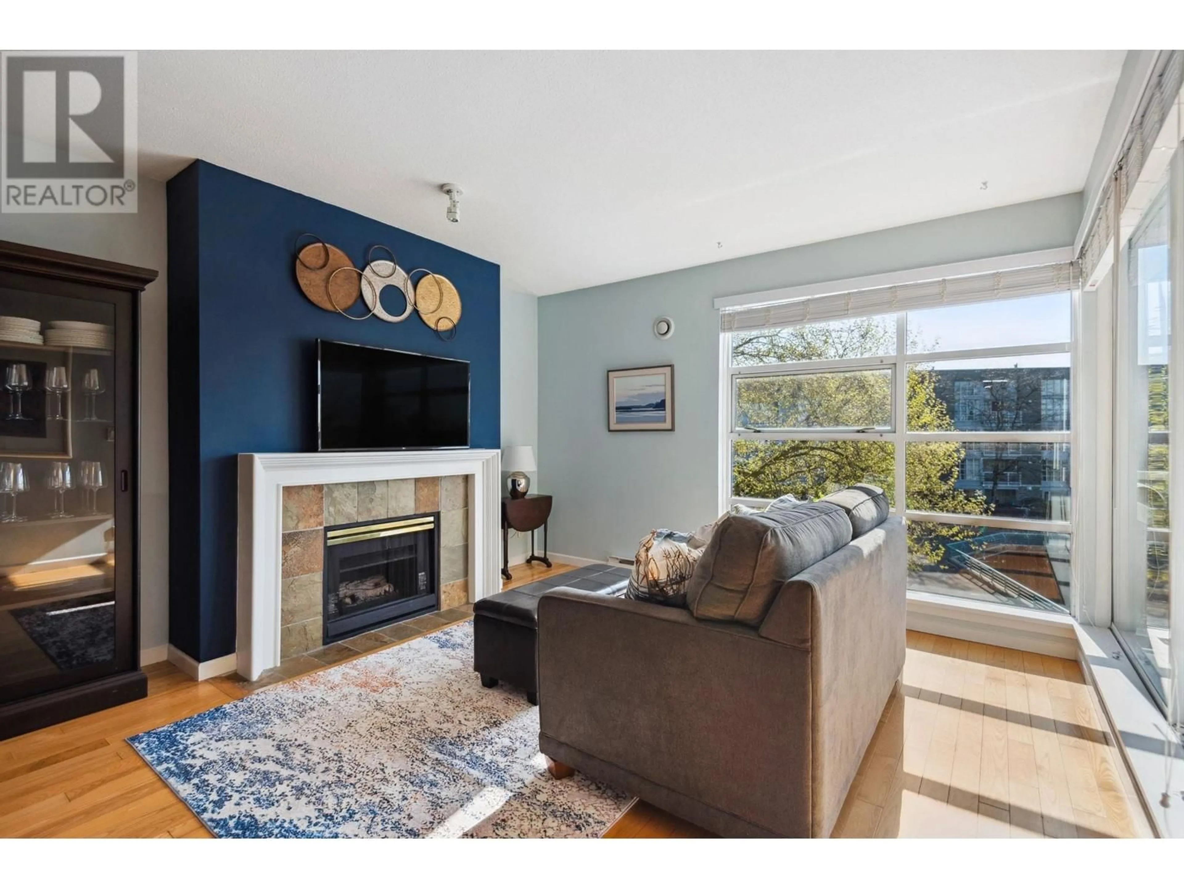 Living room with furniture, wood/laminate floor for 311 - 1990 KENT AVENUE SOUTH, Vancouver British Columbia V5P4X5