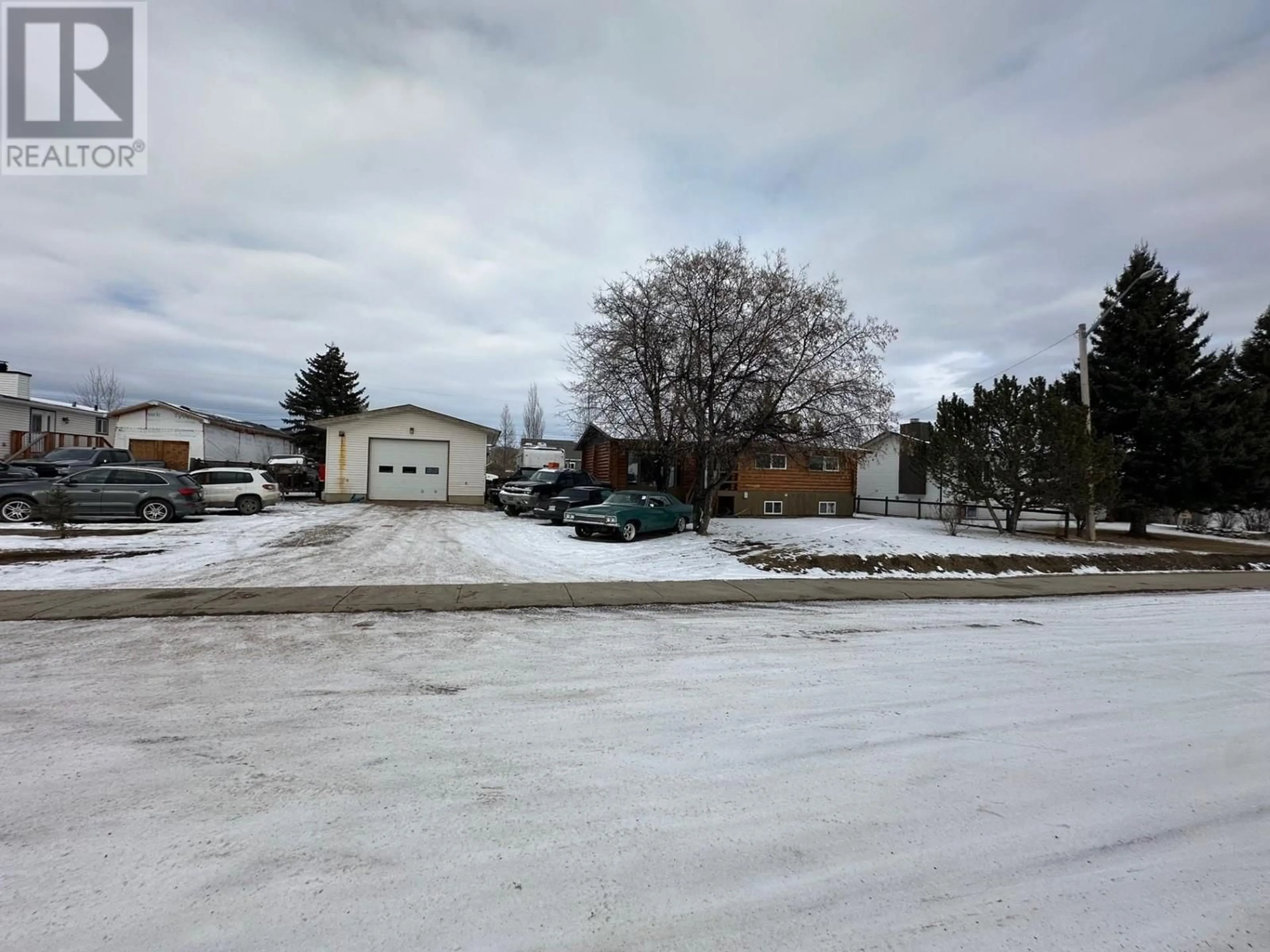 A pic from outside/outdoor area/front of a property/back of a property/a pic from drone, street for 10239 98 STREET, Taylor British Columbia V0C1H0