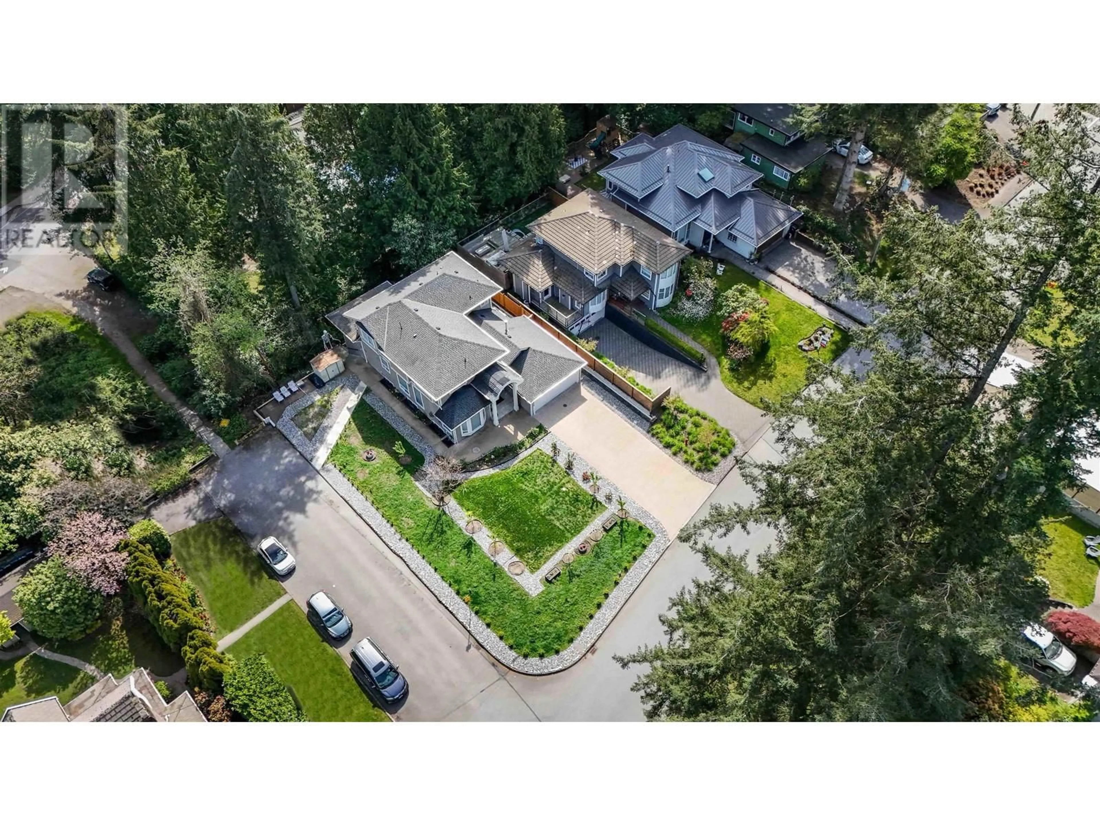 A pic from outside/outdoor area/front of a property/back of a property/a pic from drone, street for 2060 CORTELL STREET, North Vancouver British Columbia V7P2A5