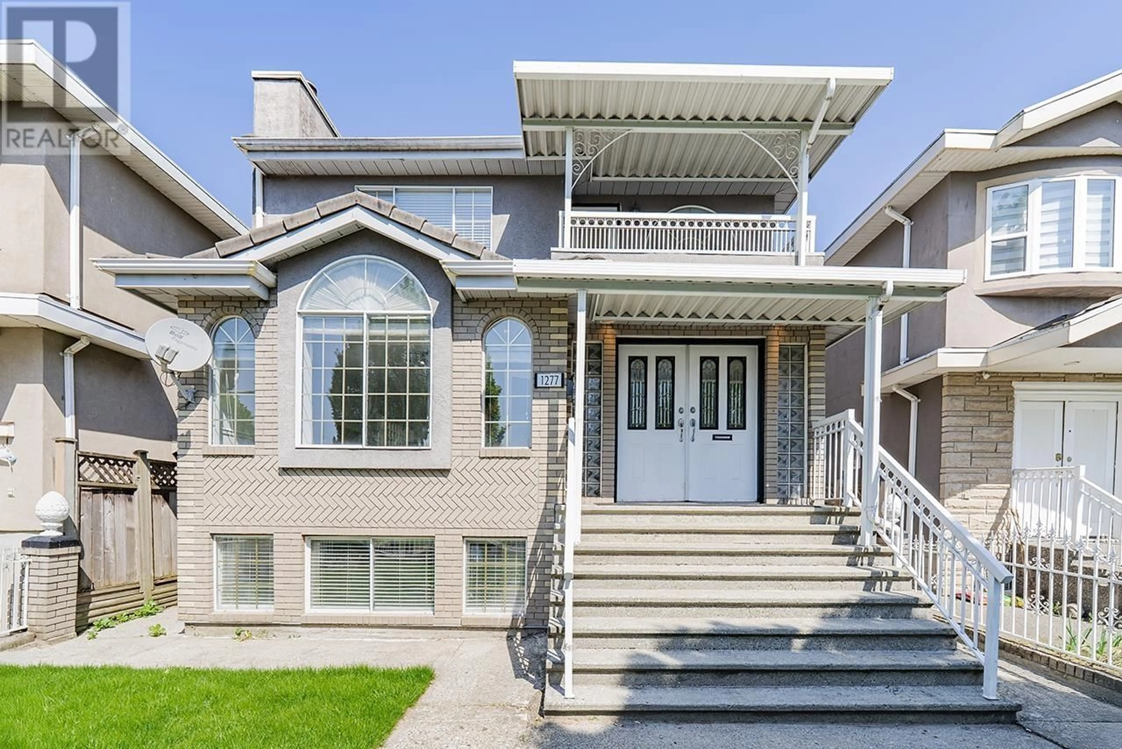 Home with vinyl exterior material, street for 1277 64TH AVENUE, Vancouver British Columbia V5X2N8