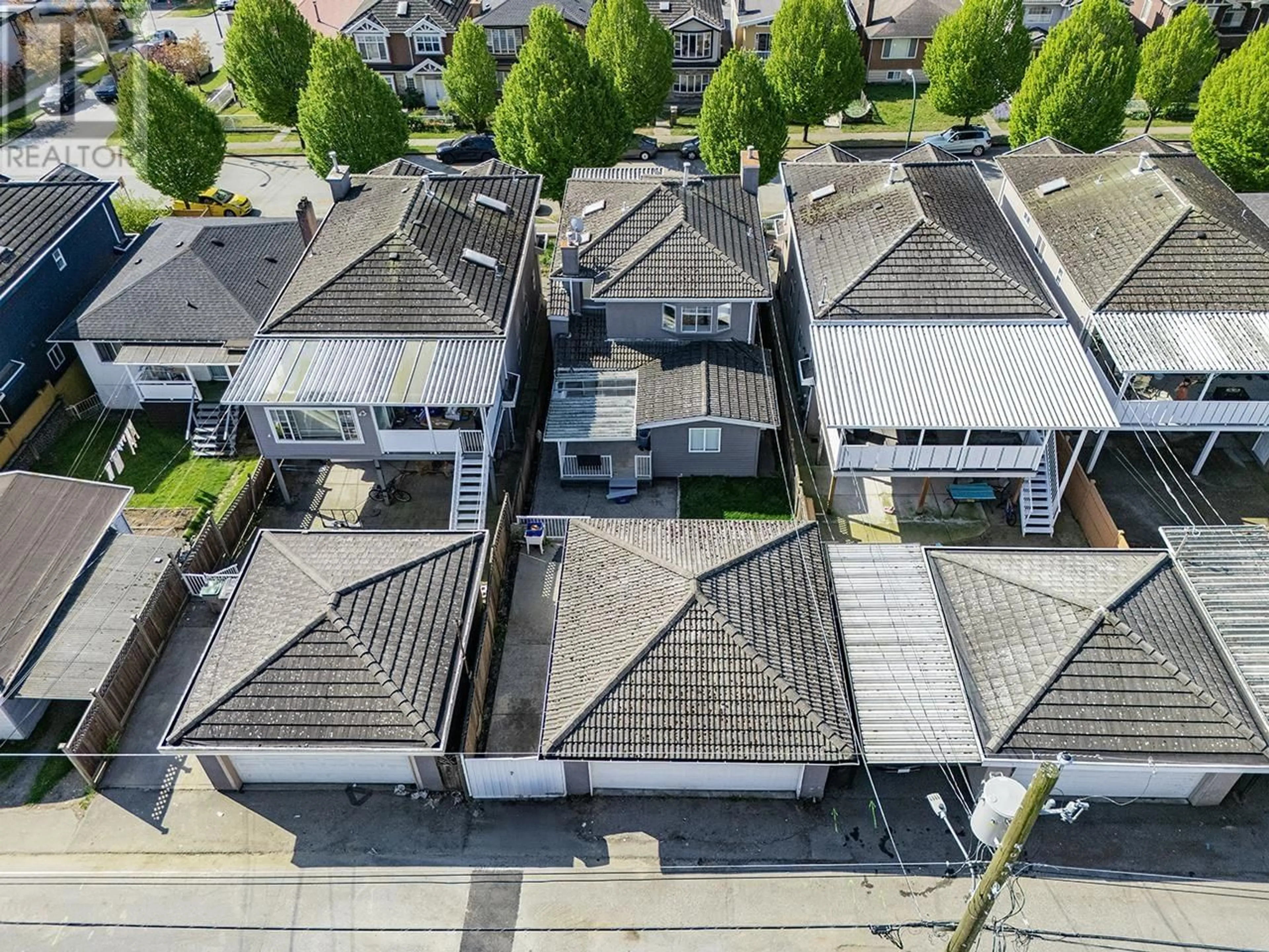 A pic from outside/outdoor area/front of a property/back of a property/a pic from drone, street for 1277 64TH AVENUE, Vancouver British Columbia V5X2N8