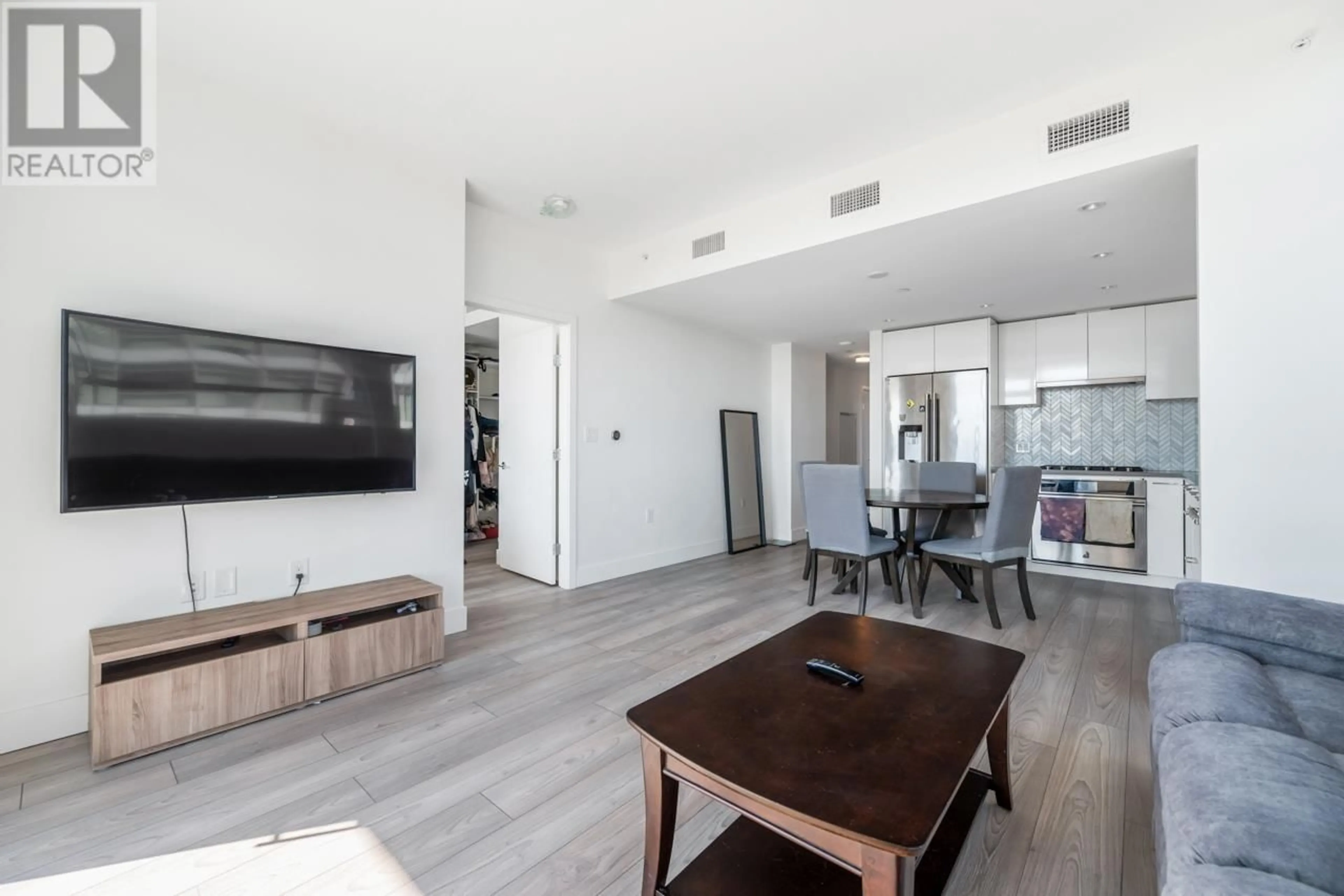 Living room with furniture, unknown for 502 - 8570 RIVERGRASS DRIVE, Vancouver British Columbia V5S0H4
