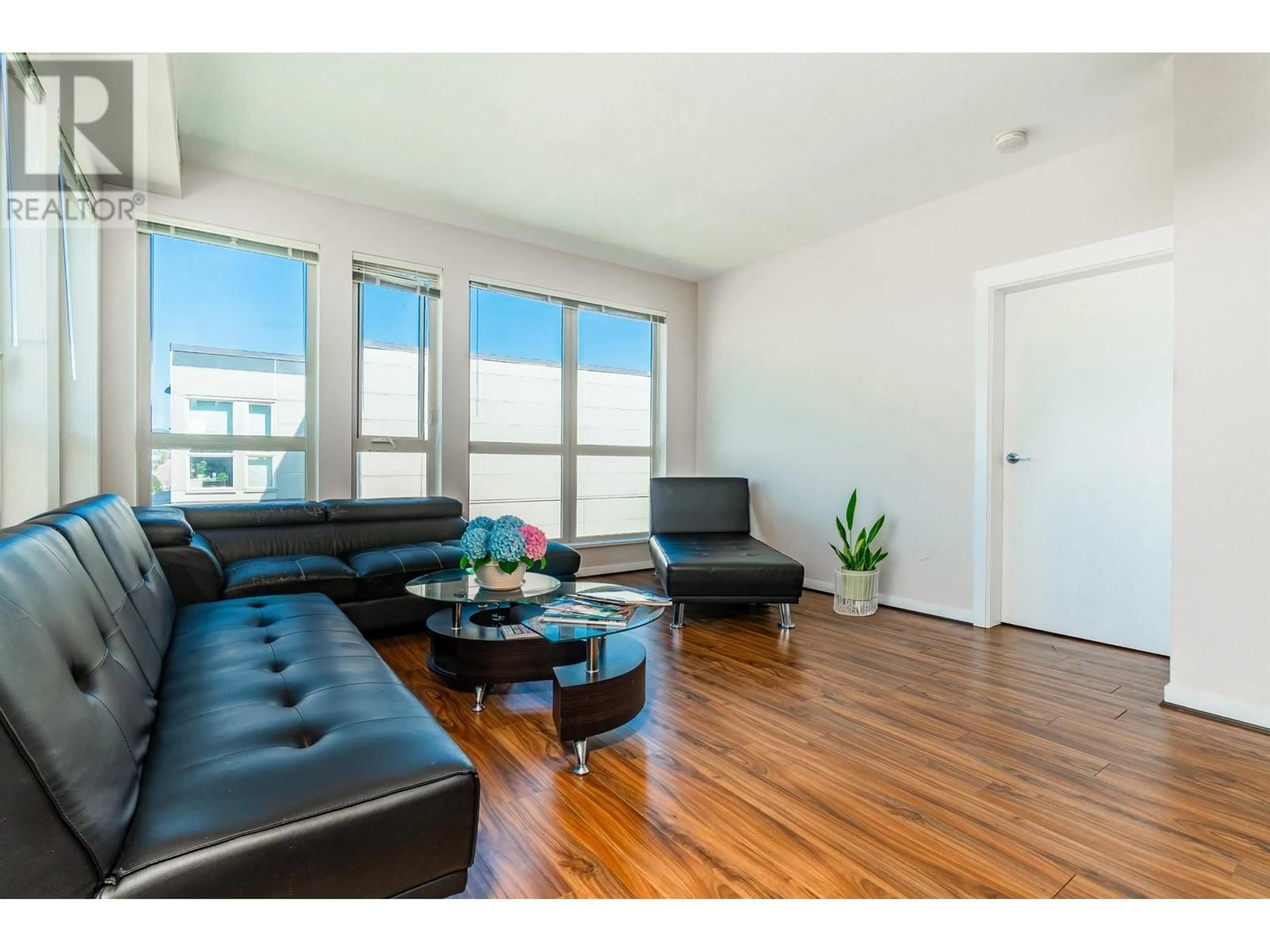 Living room with furniture, wood/laminate floor for 795 - 4133 STOLBERG STREET, Richmond British Columbia V6X0J3