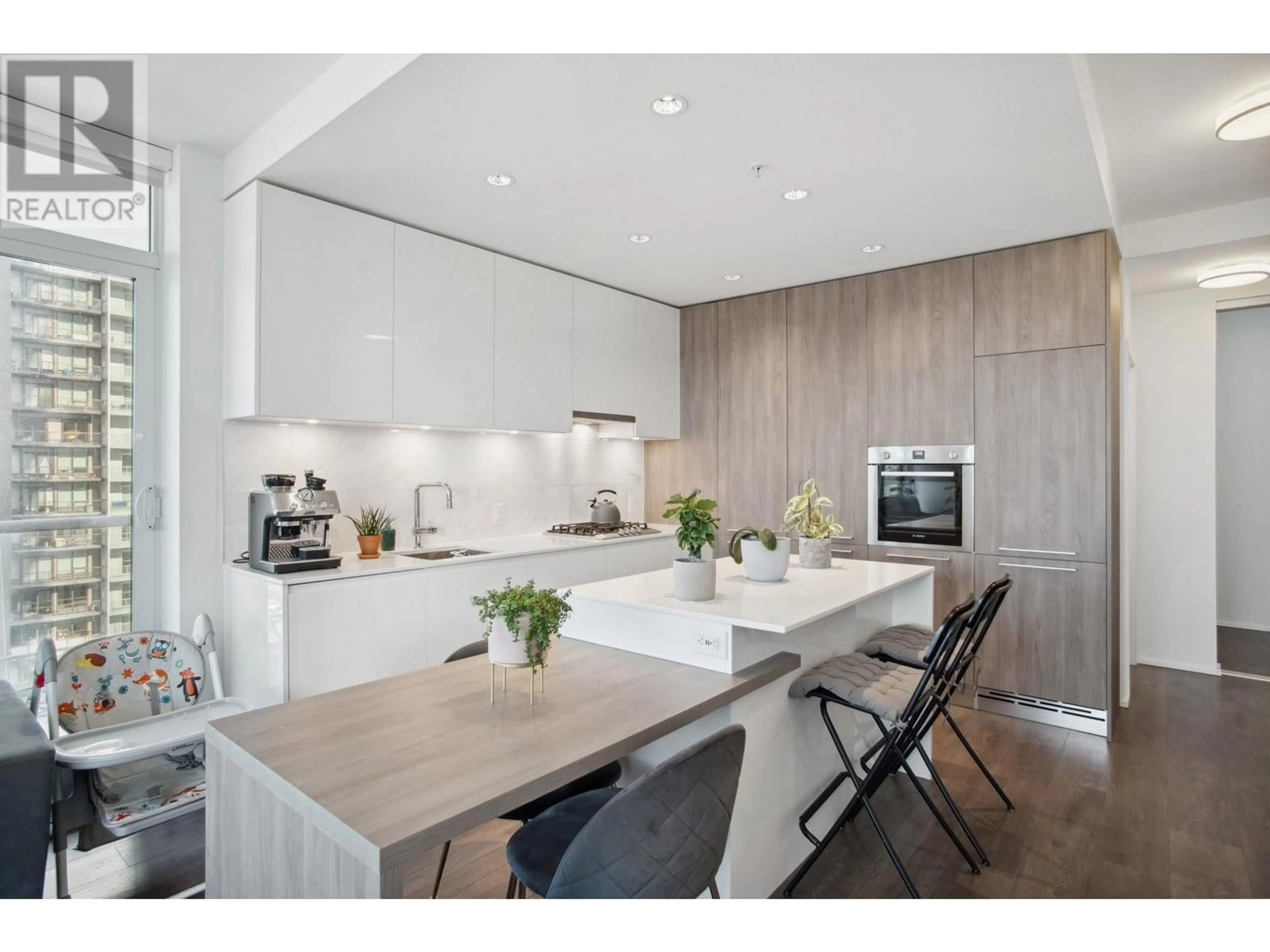 Open concept kitchen, wood/laminate floor for 2812 - 1955 ALPHA WAY, Burnaby British Columbia V5C0K6