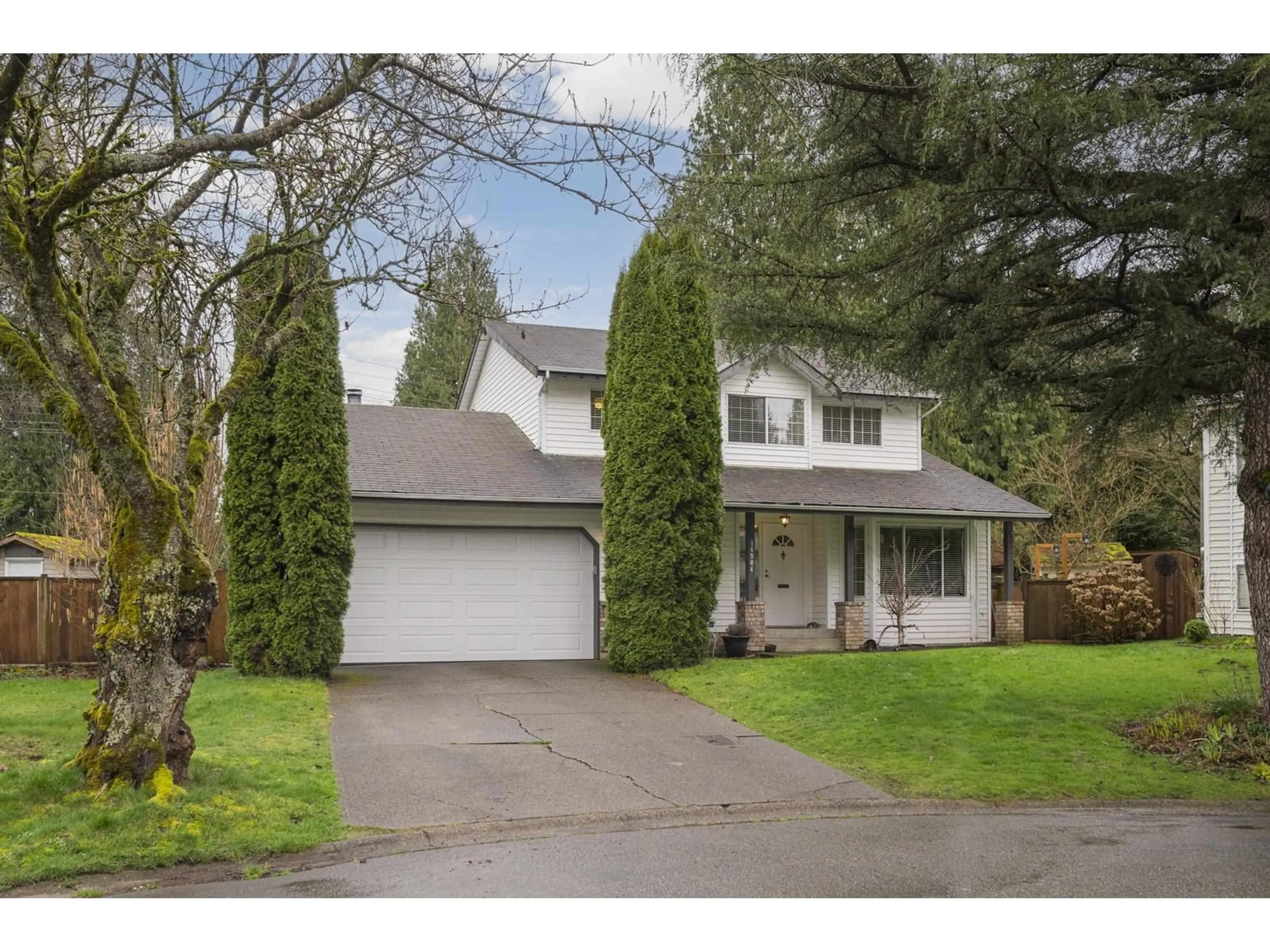 Home with vinyl exterior material, street for 14904 95A, Surrey British Columbia V3R7T6