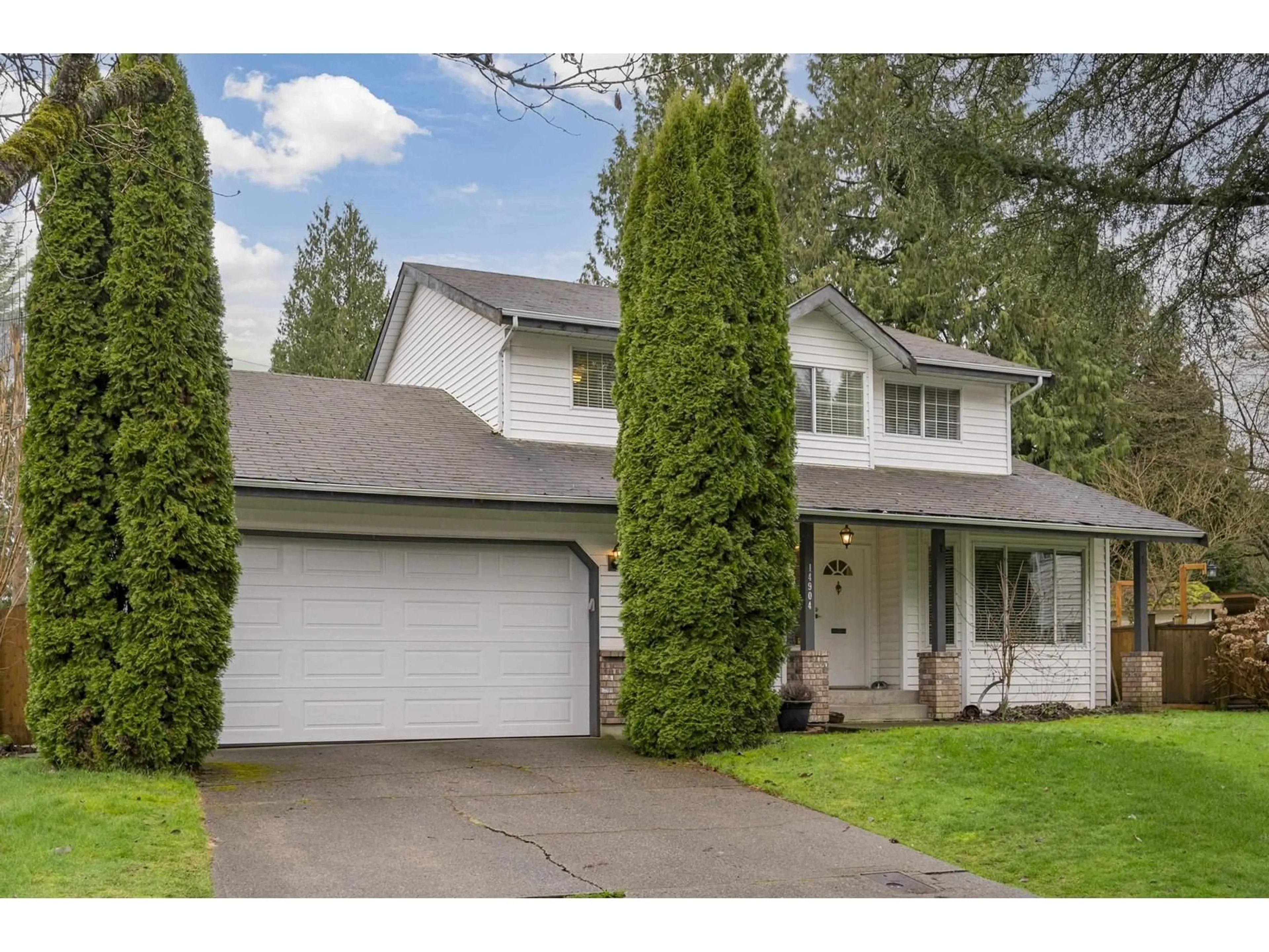 Home with vinyl exterior material, street for 14904 95A, Surrey British Columbia V3R7T6