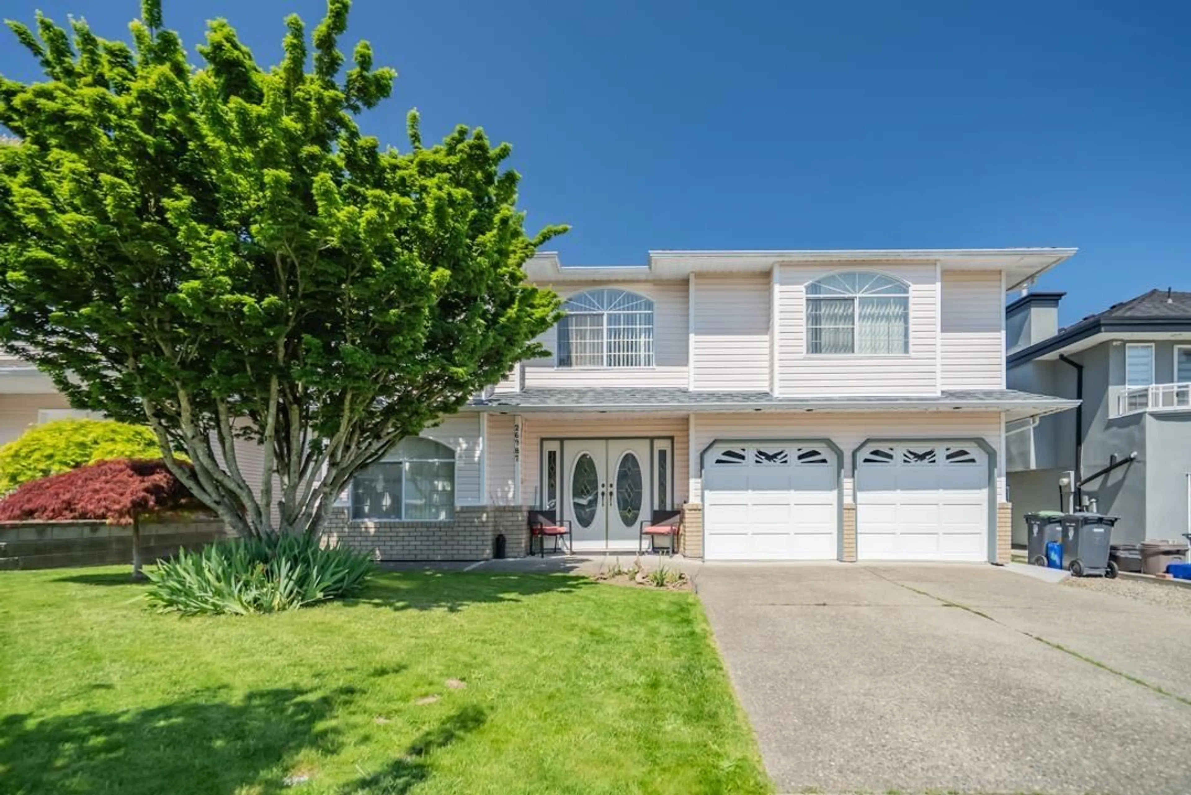 Home with vinyl exterior material, street for 26987 27, Langley British Columbia V4W3E7