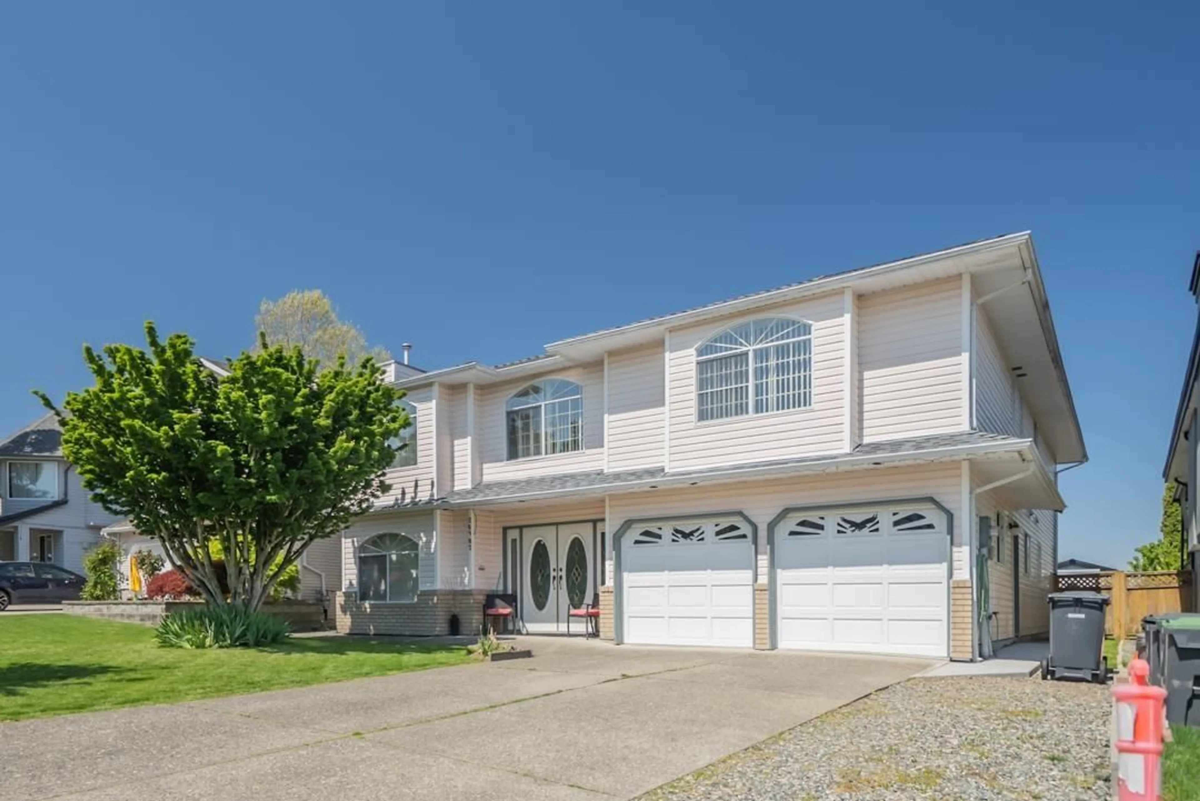 Home with vinyl exterior material, street for 26987 27, Langley British Columbia V4W3E7