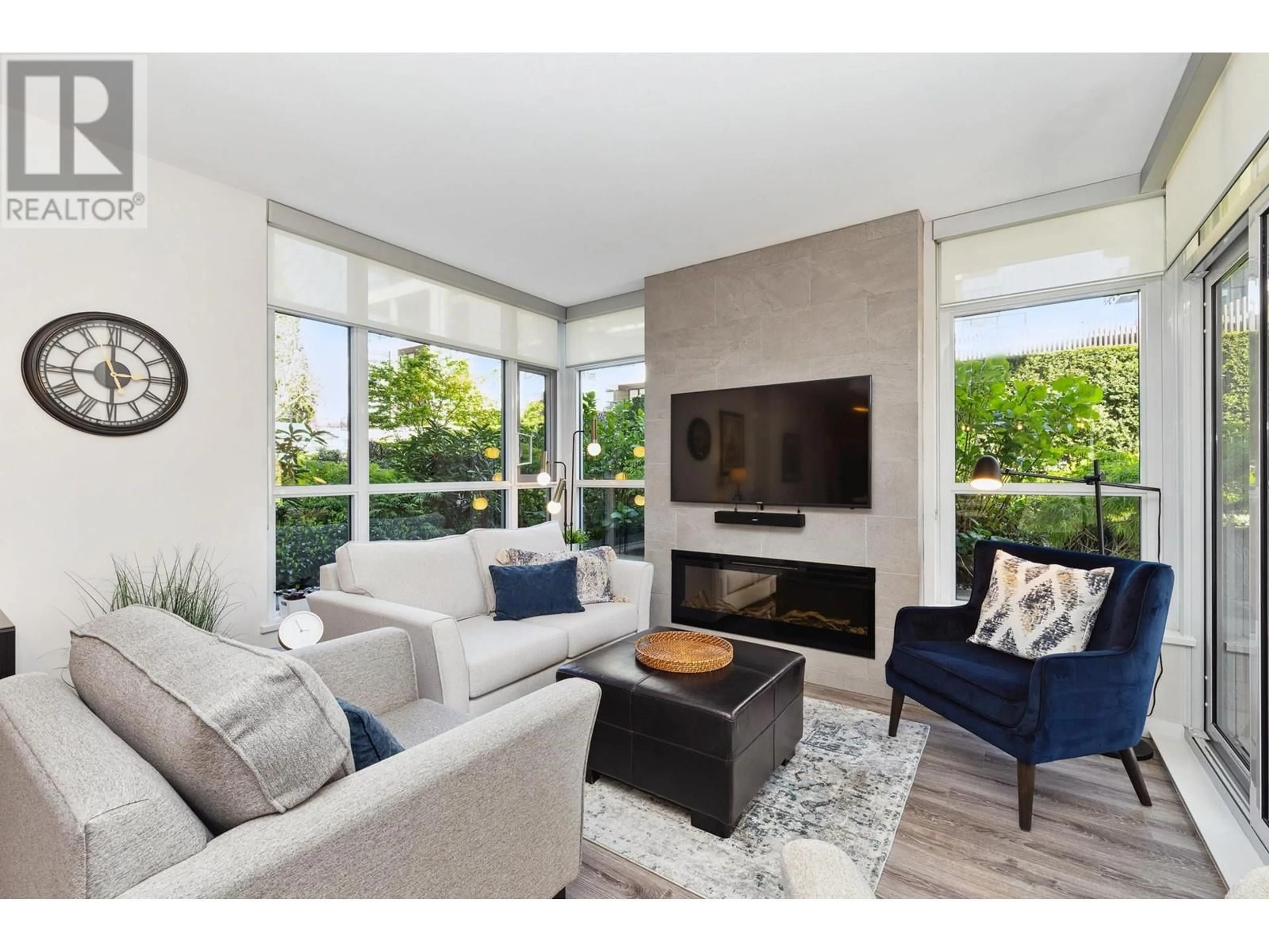 Living room with furniture, unknown for 101 - 711 BRESLAY STREET, Coquitlam British Columbia V3J0G7