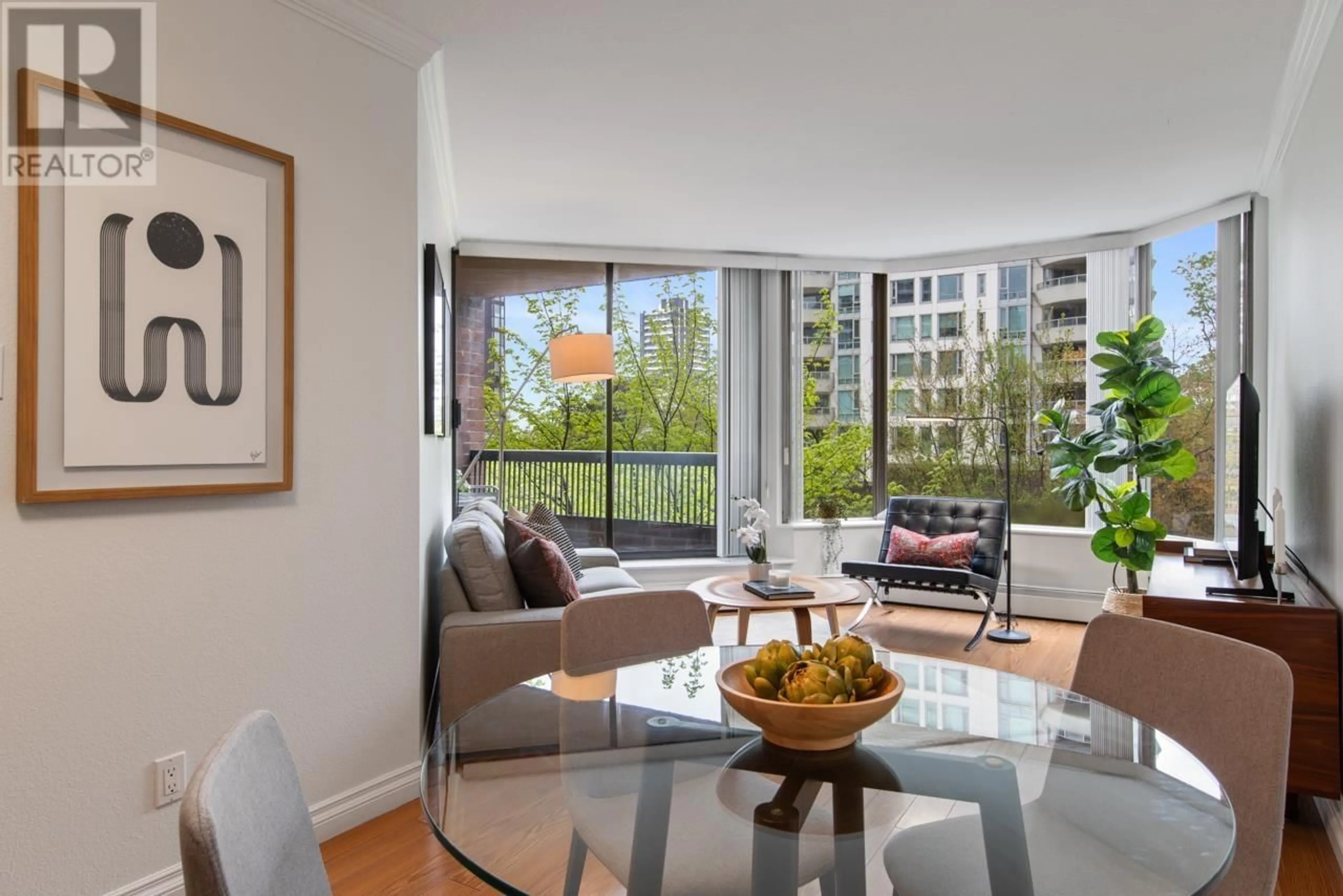 Living room with furniture, wood/laminate floor for 407 - 1330 BURRARD STREET, Vancouver British Columbia V6Z2B8
