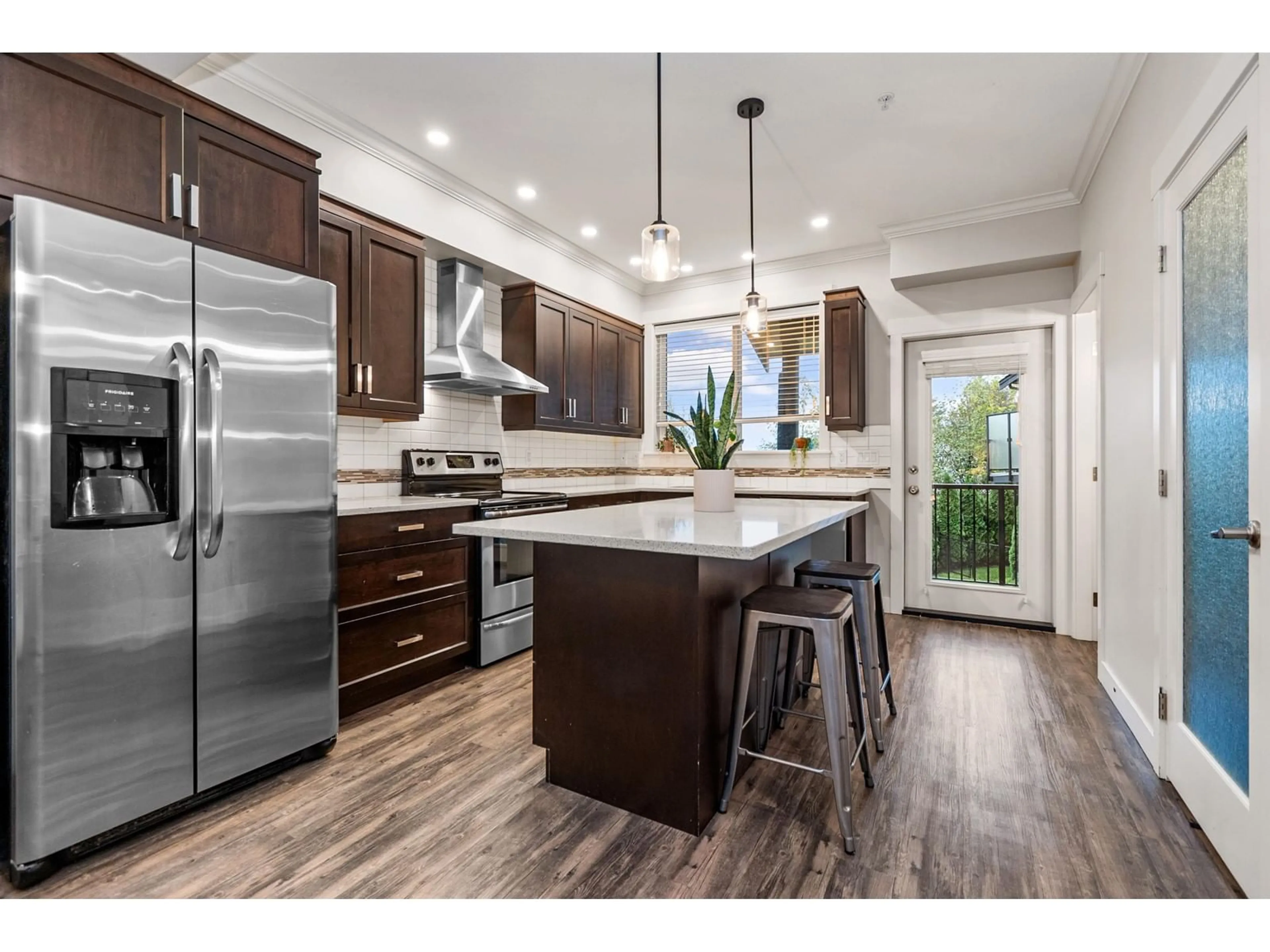 Open concept kitchen, wood/laminate floor for 21 - 5756 PROMONTORY ROAD, Chilliwack British Columbia V2R0V8