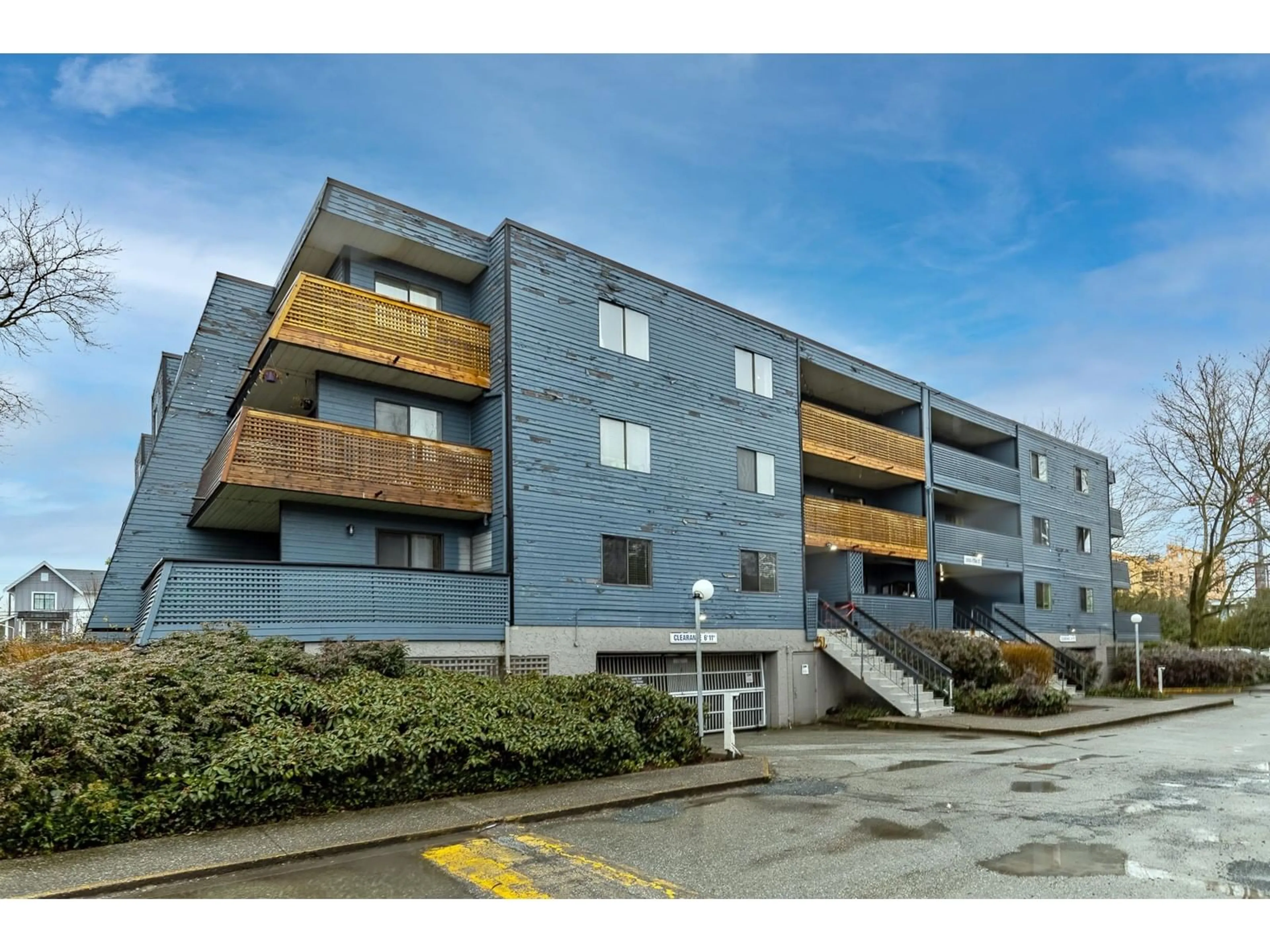 A pic from outside/outdoor area/front of a property/back of a property/a pic from drone, building for 104 - 5906 176A, Surrey British Columbia V3H4H7