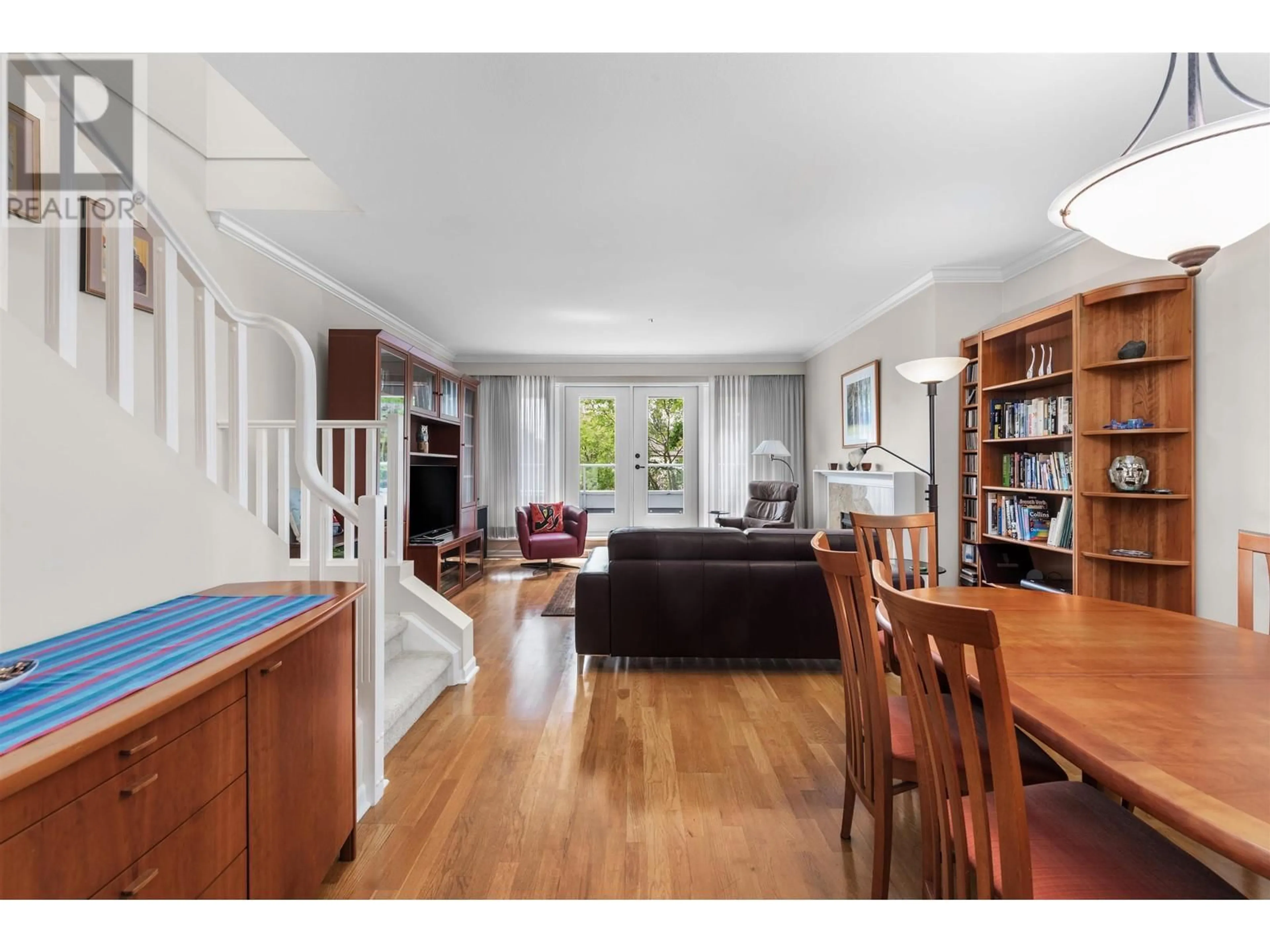 Living room with furniture, wood/laminate floor for 202 - 3189 CAMOSUN STREET, Vancouver British Columbia V6R3X2
