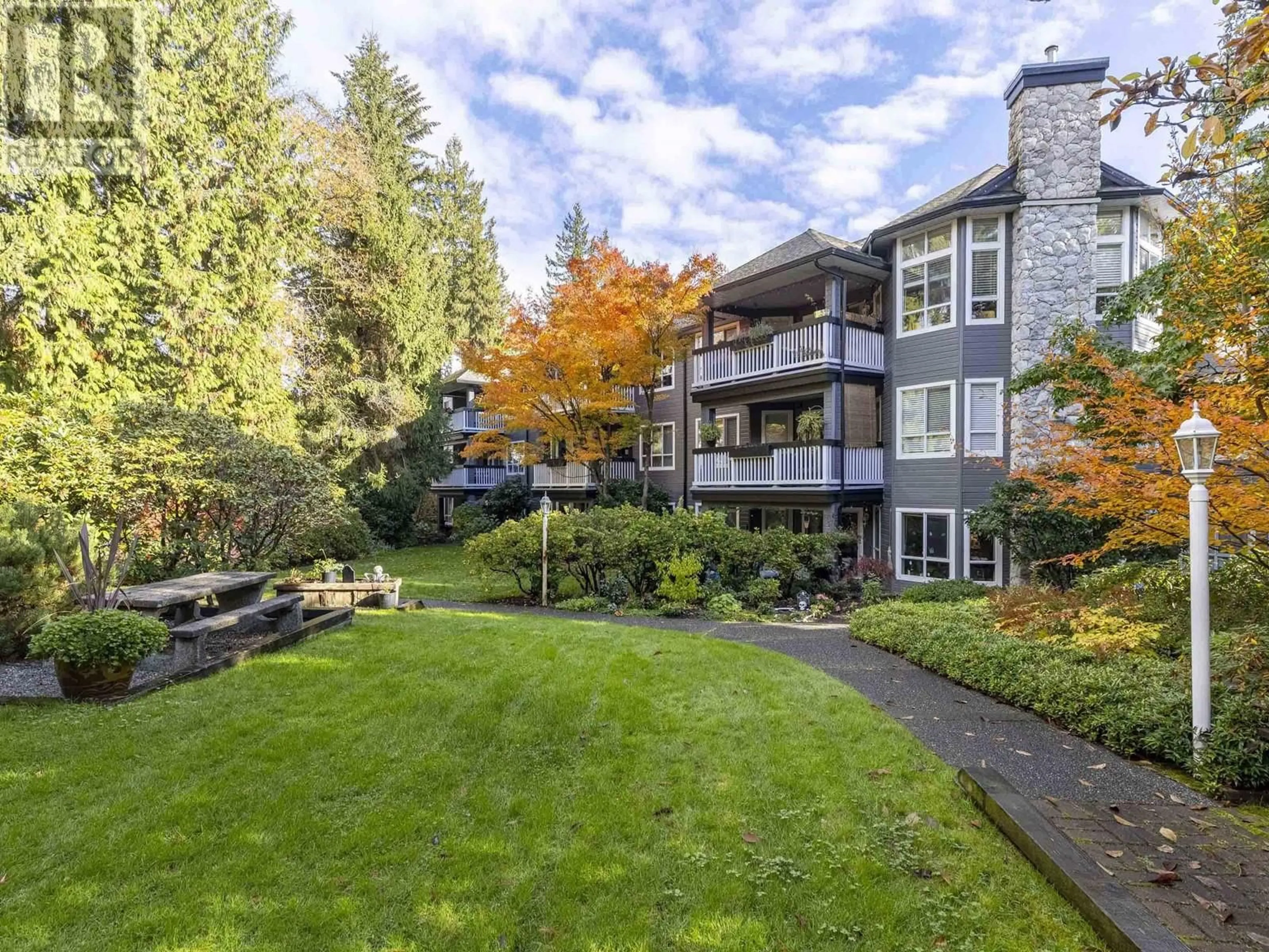 A pic from outside/outdoor area/front of a property/back of a property/a pic from drone, water/lake/river/ocean view for 105 - 1150 LYNN VALLEY ROAD, North Vancouver British Columbia V7J1Z9