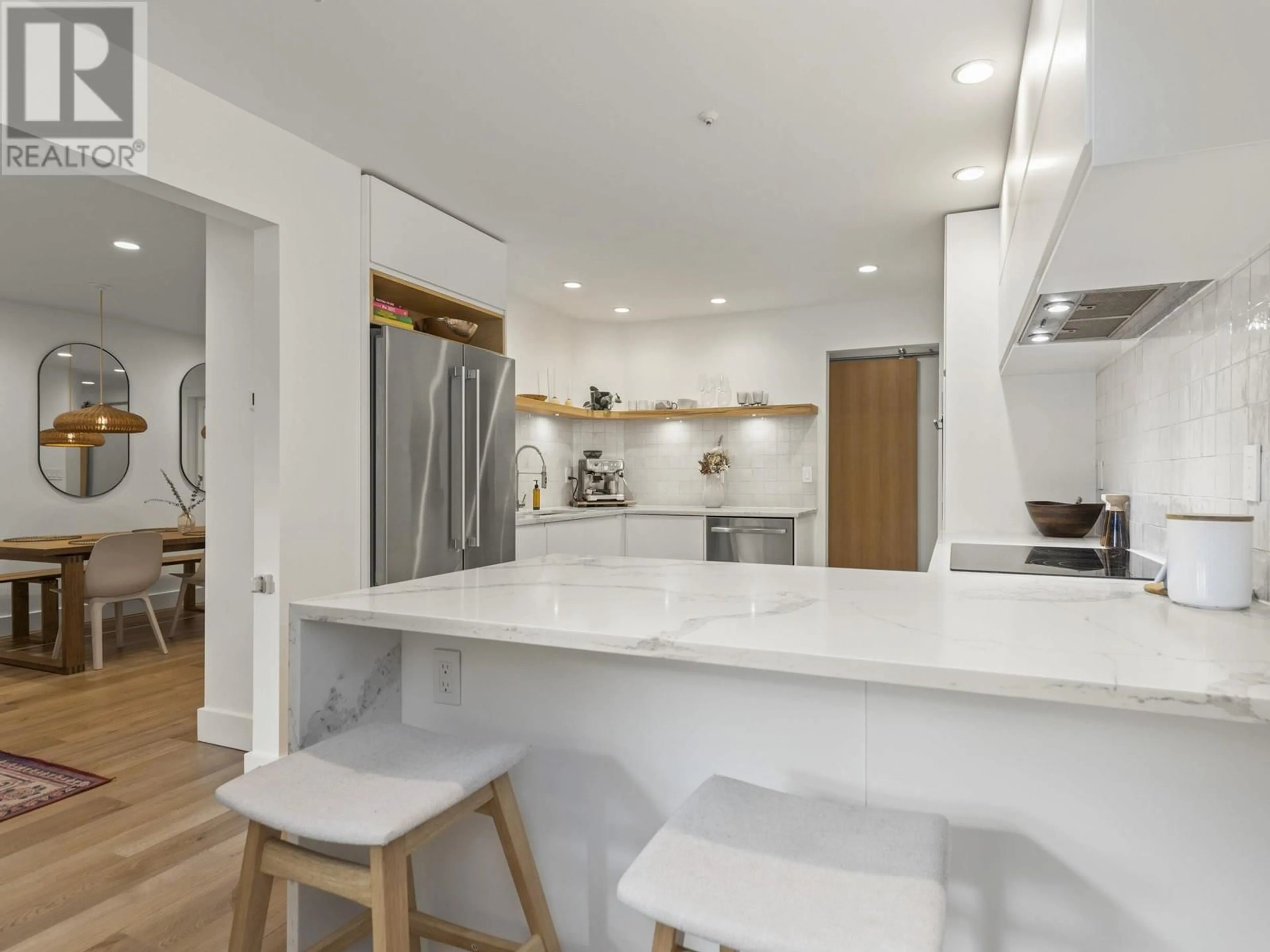 Open concept kitchen, unknown for 105 - 1150 LYNN VALLEY ROAD, North Vancouver British Columbia V7J1Z9