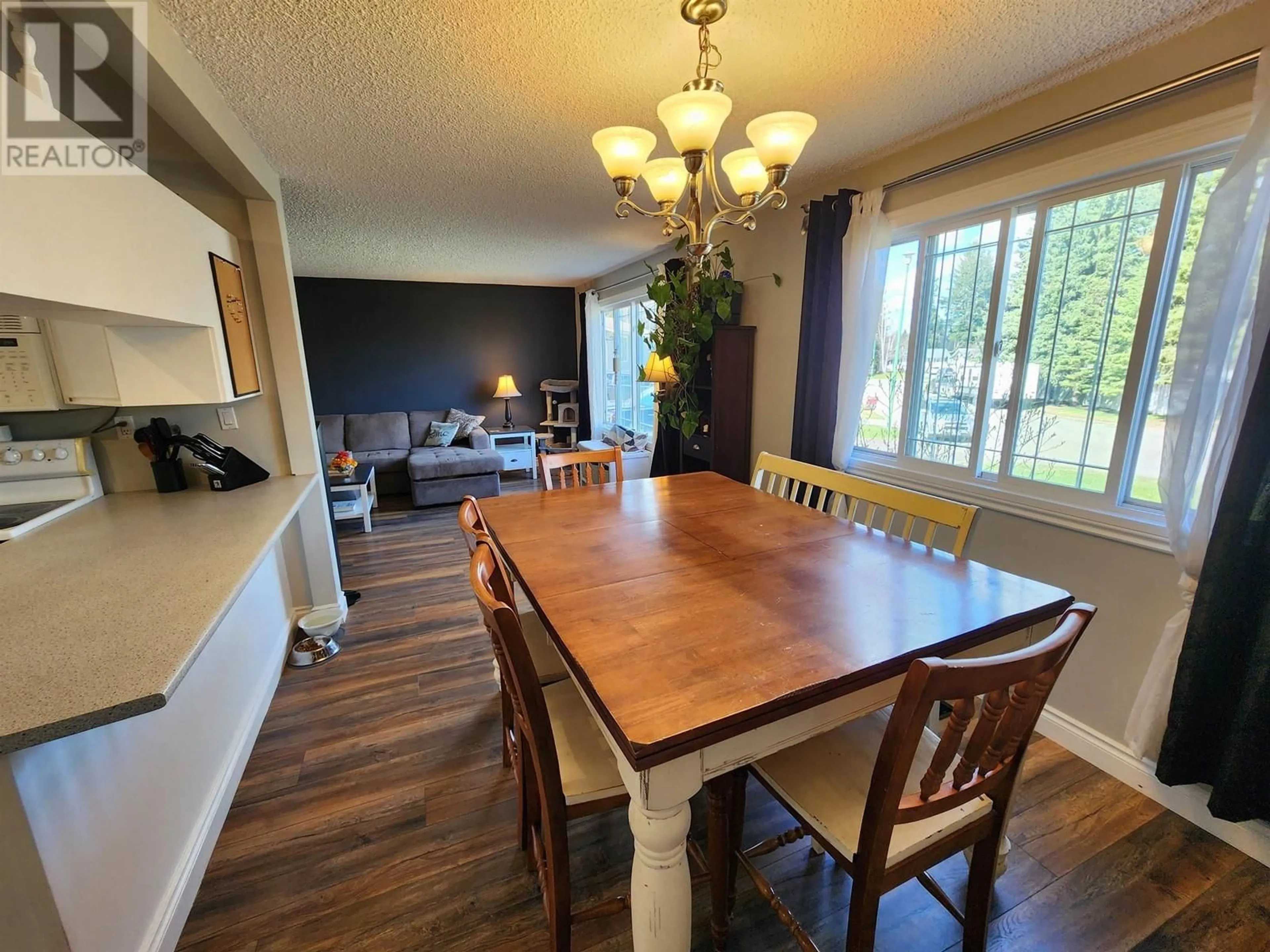 Dining room, wood/laminate floor for 6151 CALEDONIA CRESCENT, Prince George British Columbia V2N2H5