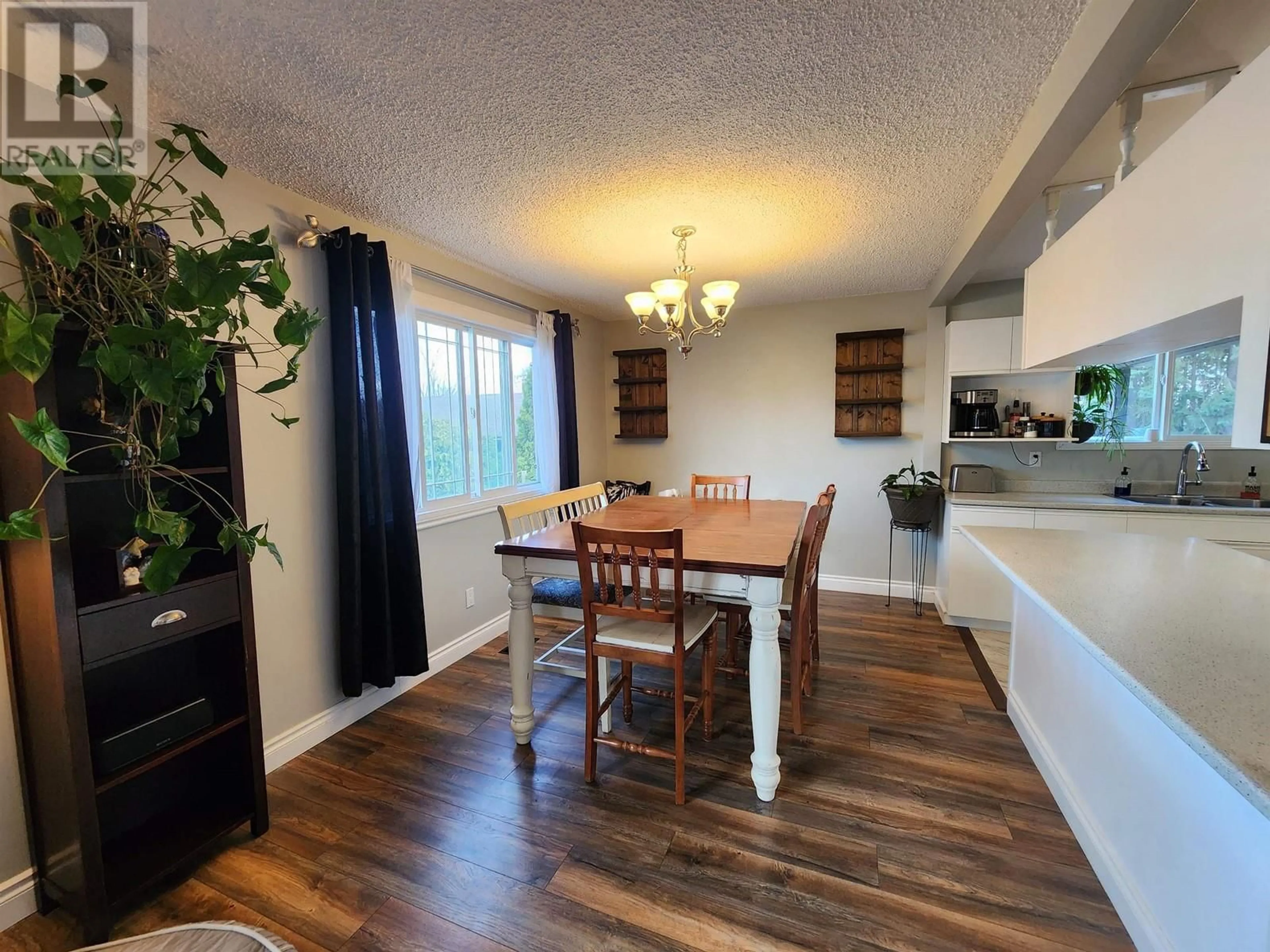 Dining room, wood/laminate floor for 6151 CALEDONIA CRESCENT, Prince George British Columbia V2N2H5