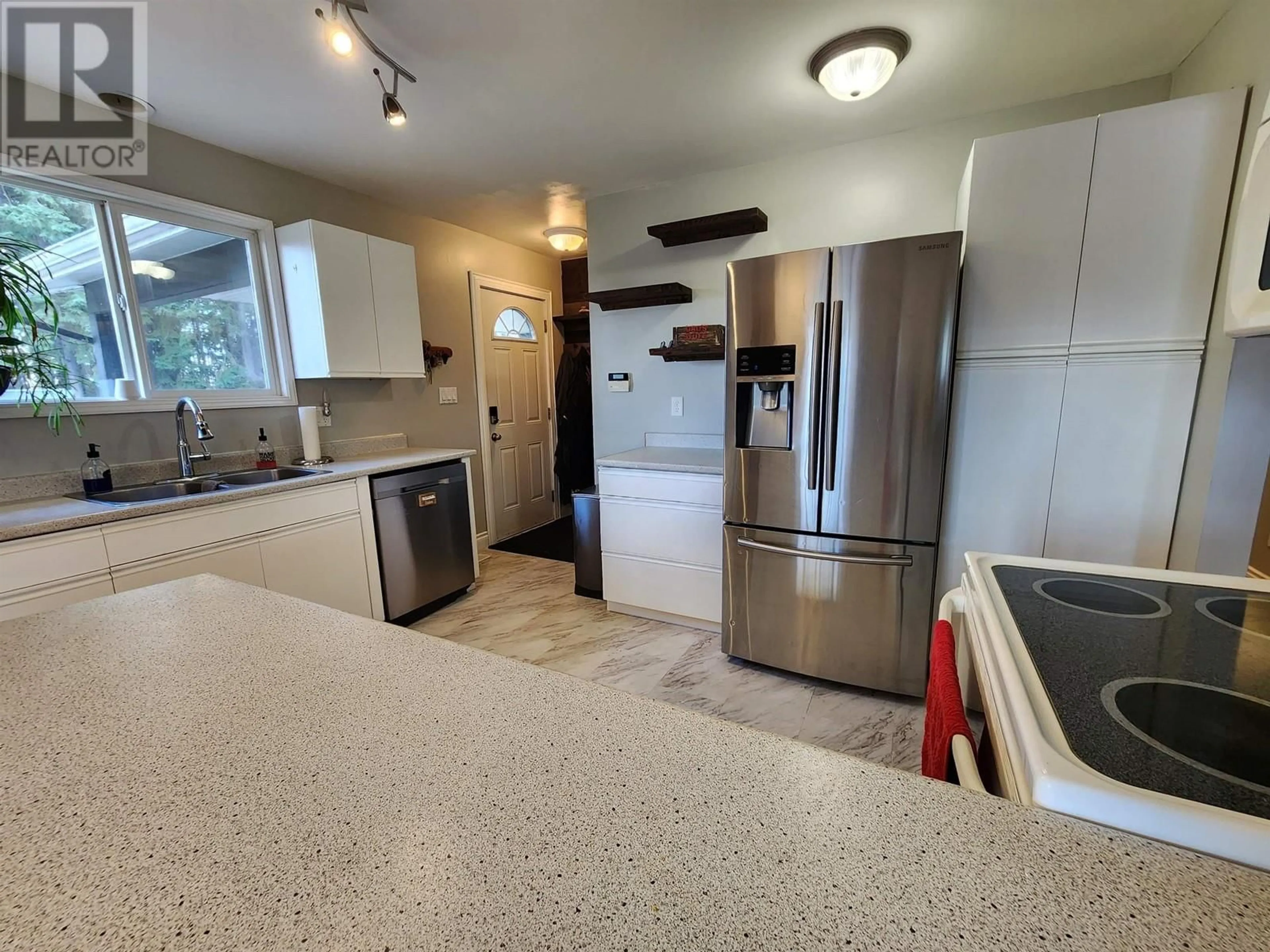 Open concept kitchen, ceramic/tile floor for 6151 CALEDONIA CRESCENT, Prince George British Columbia V2N2H5