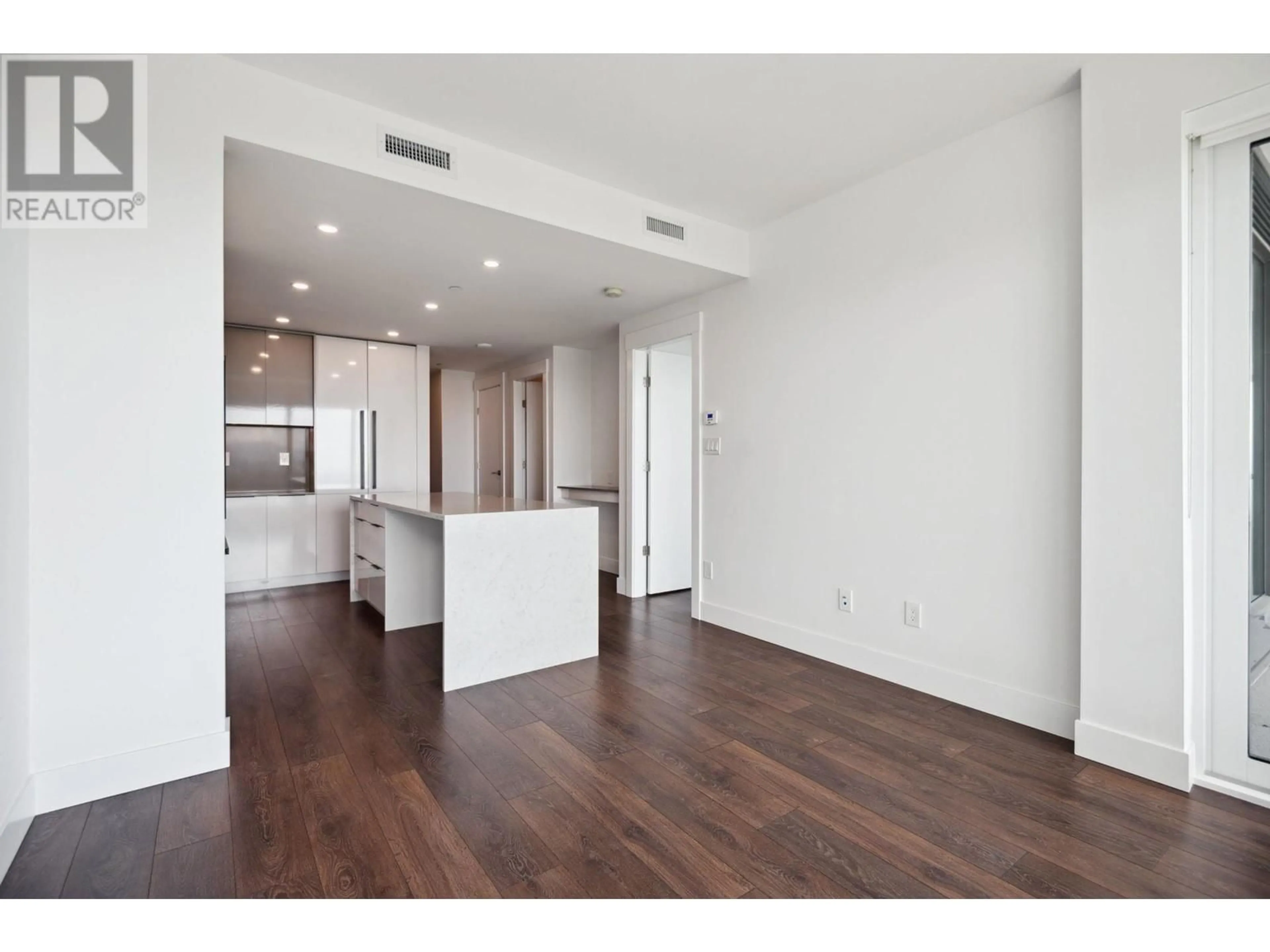 Open concept kitchen, wood/laminate floor for 3707 - 4711 HAZEL STREET, Burnaby British Columbia V5H0J9