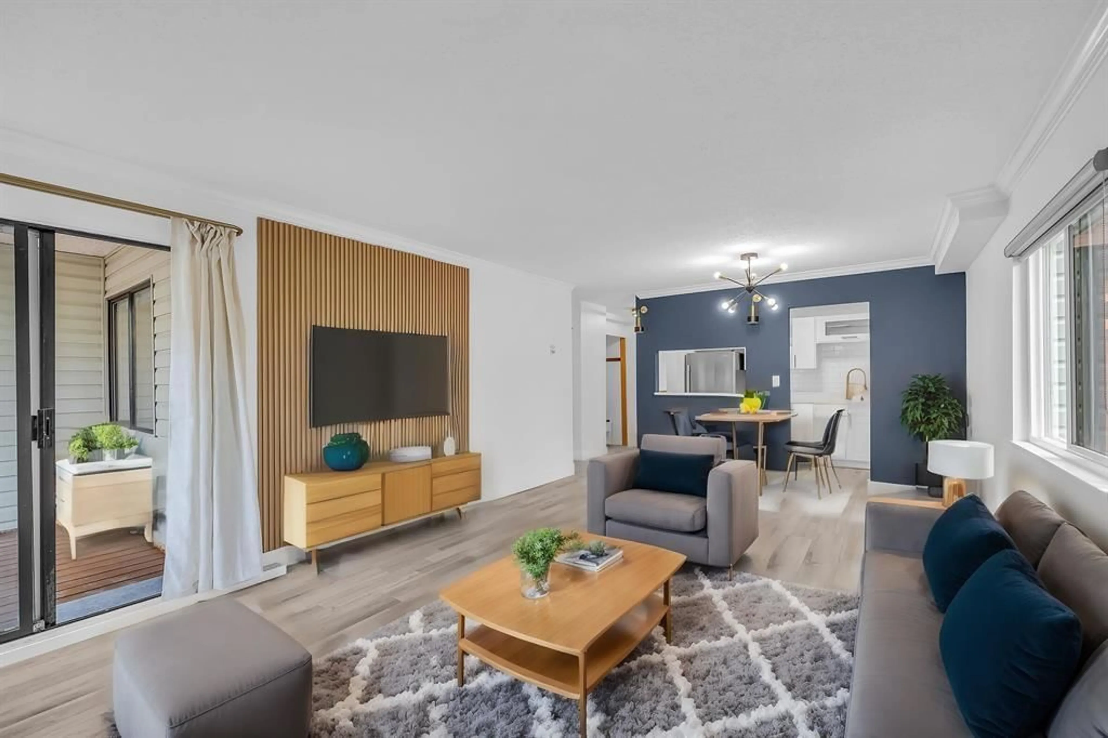 Living room with furniture, wood/laminate floor for 102 - 1555 FIR, White Rock British Columbia V4B4B6